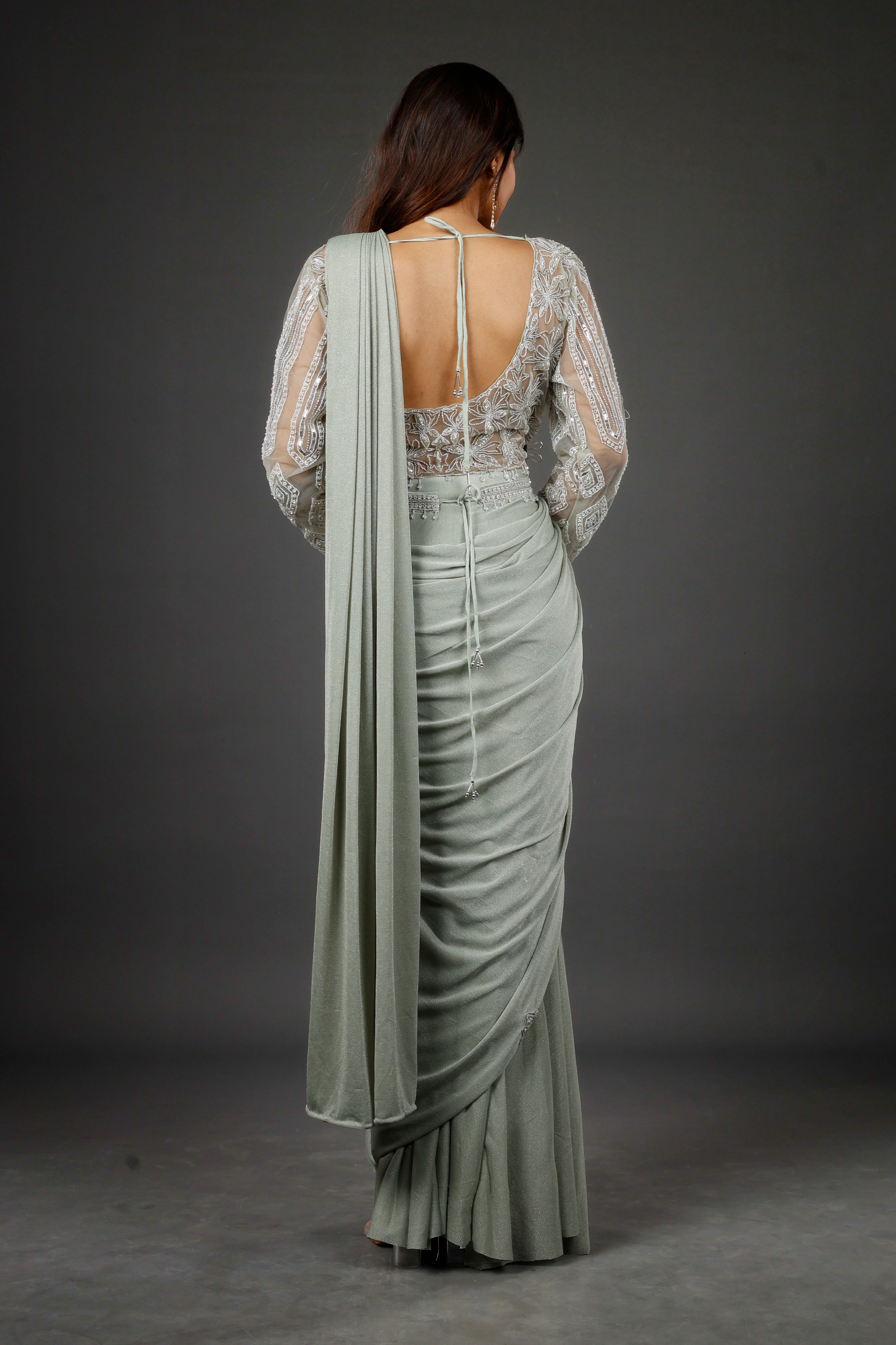 Sage Green Shimmer Drape Saree with Kutdana & Pearl Embroidery