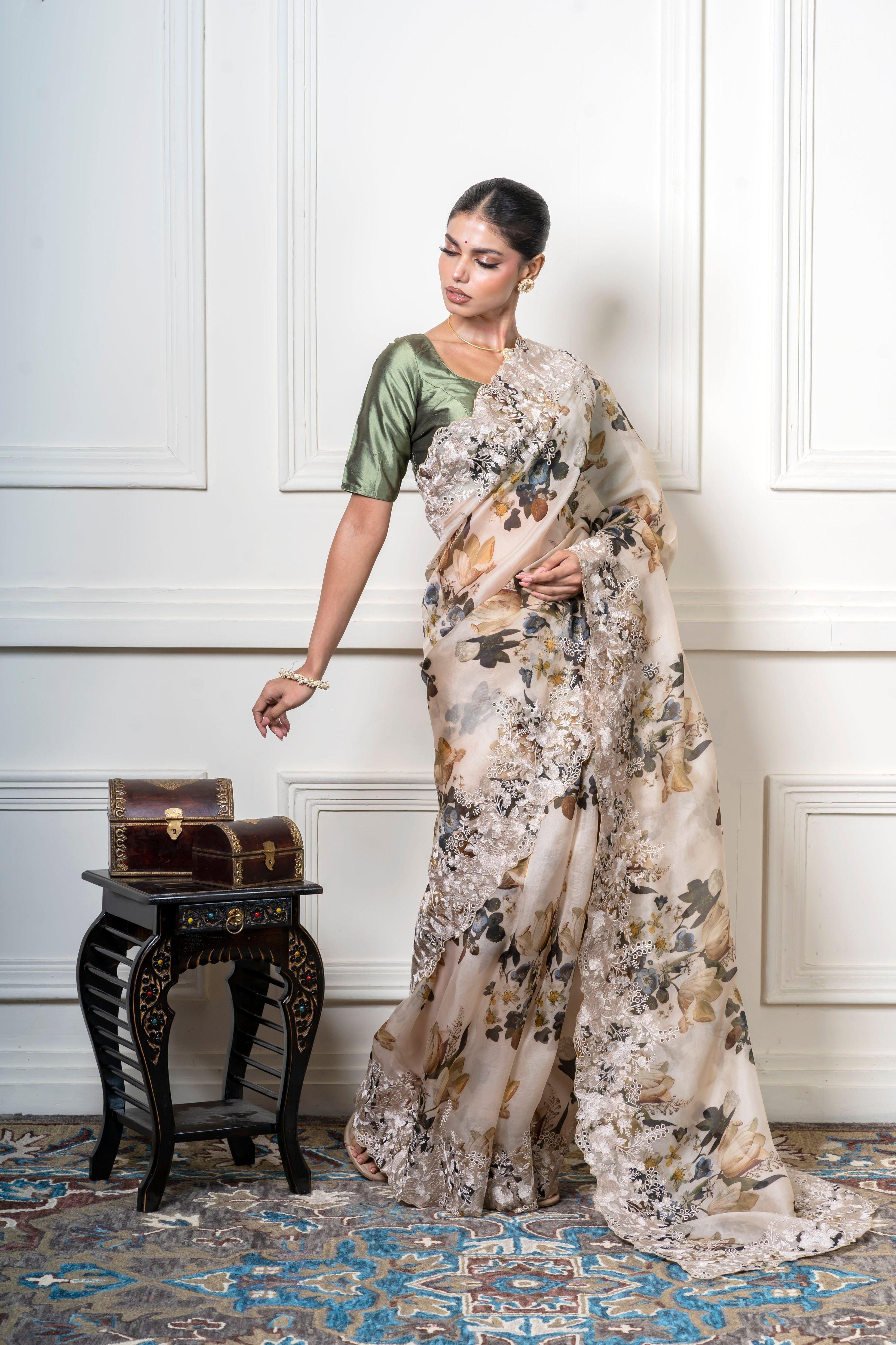 Ivory Organza Saree with Muted Floral Print and Lace Border  Mokshaa