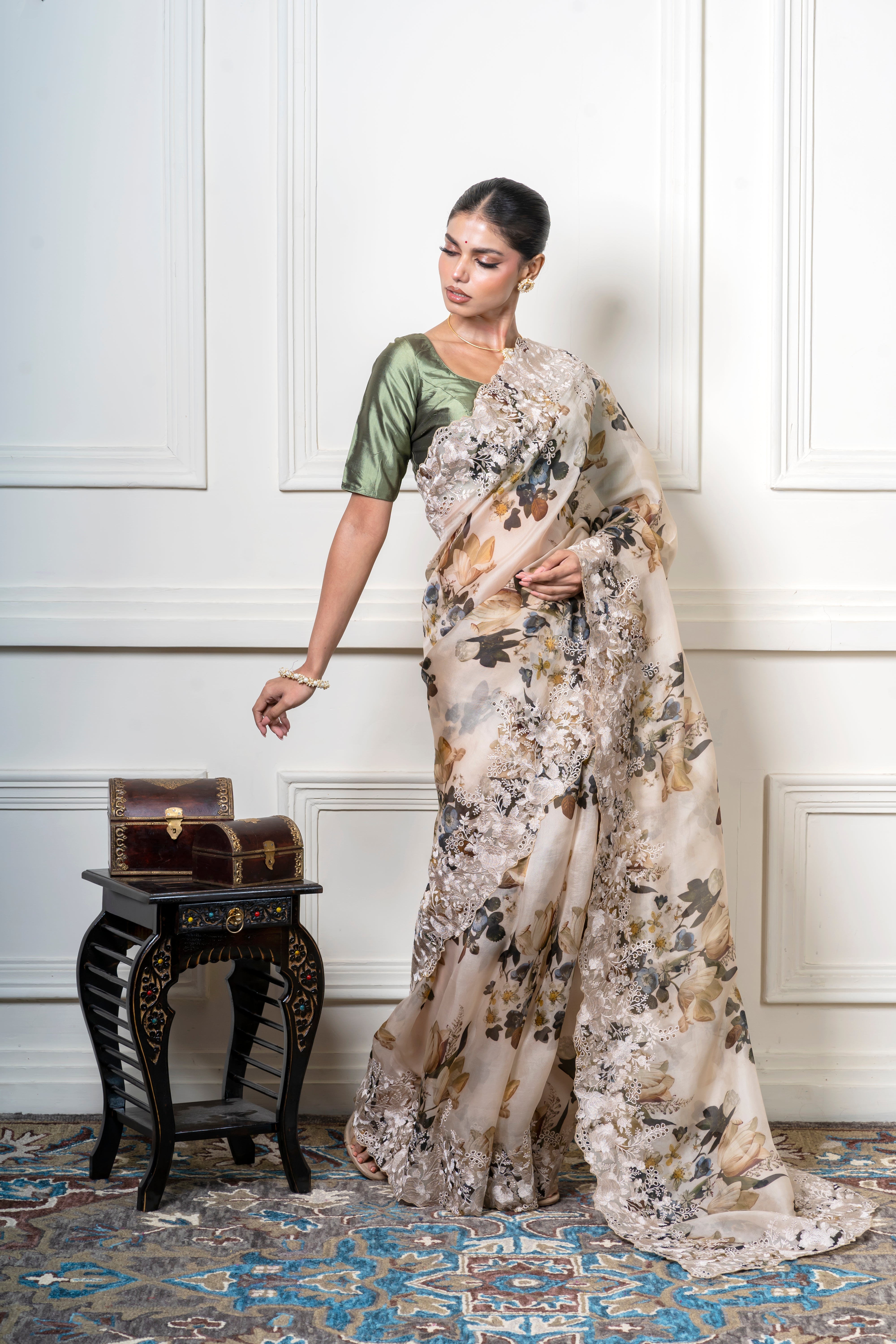 Ivory Organza Saree with Muted Floral Print and Lace Border  Mokshaa