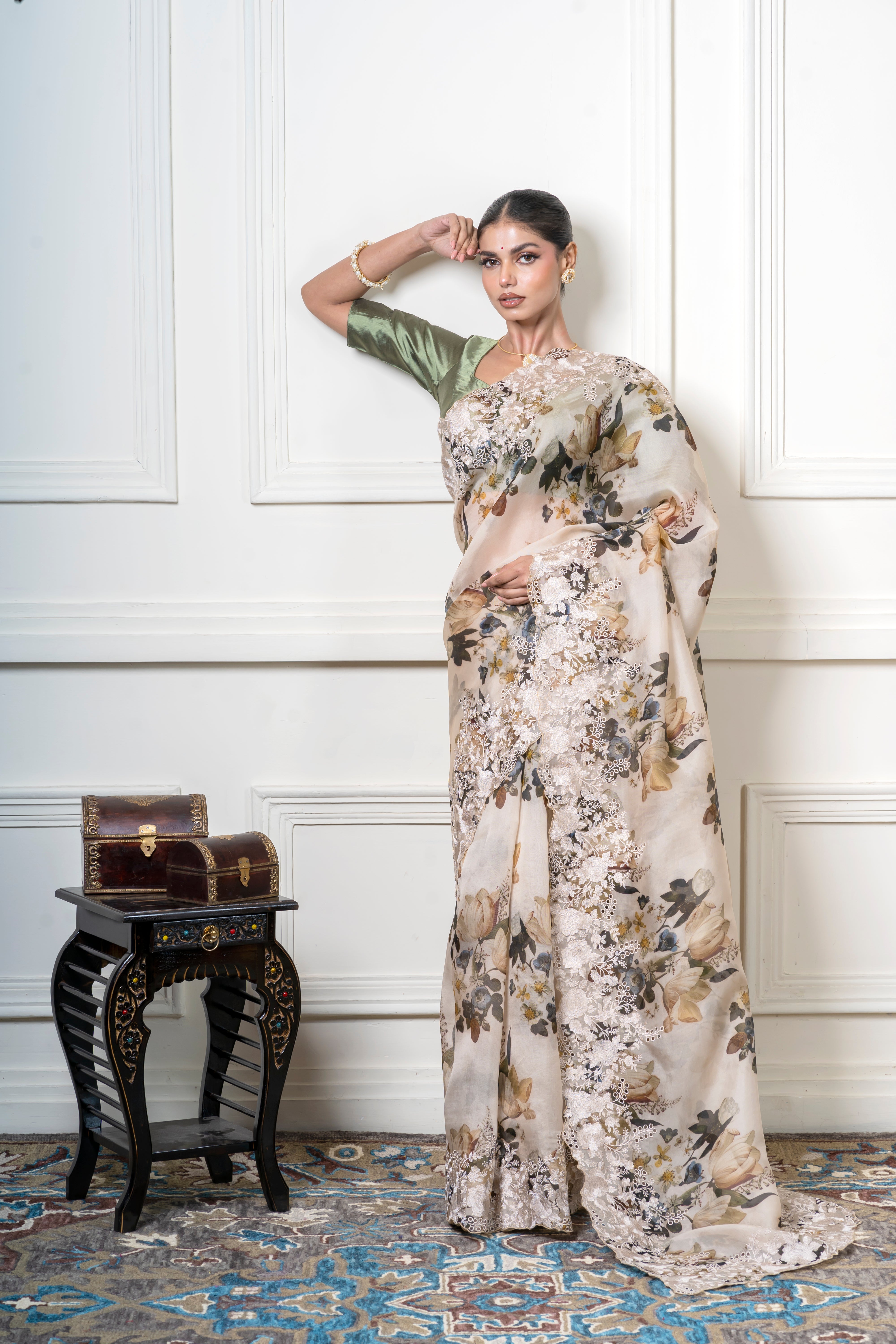 Ivory Organza Saree with Muted Floral Print and Lace Border  Mokshaa
