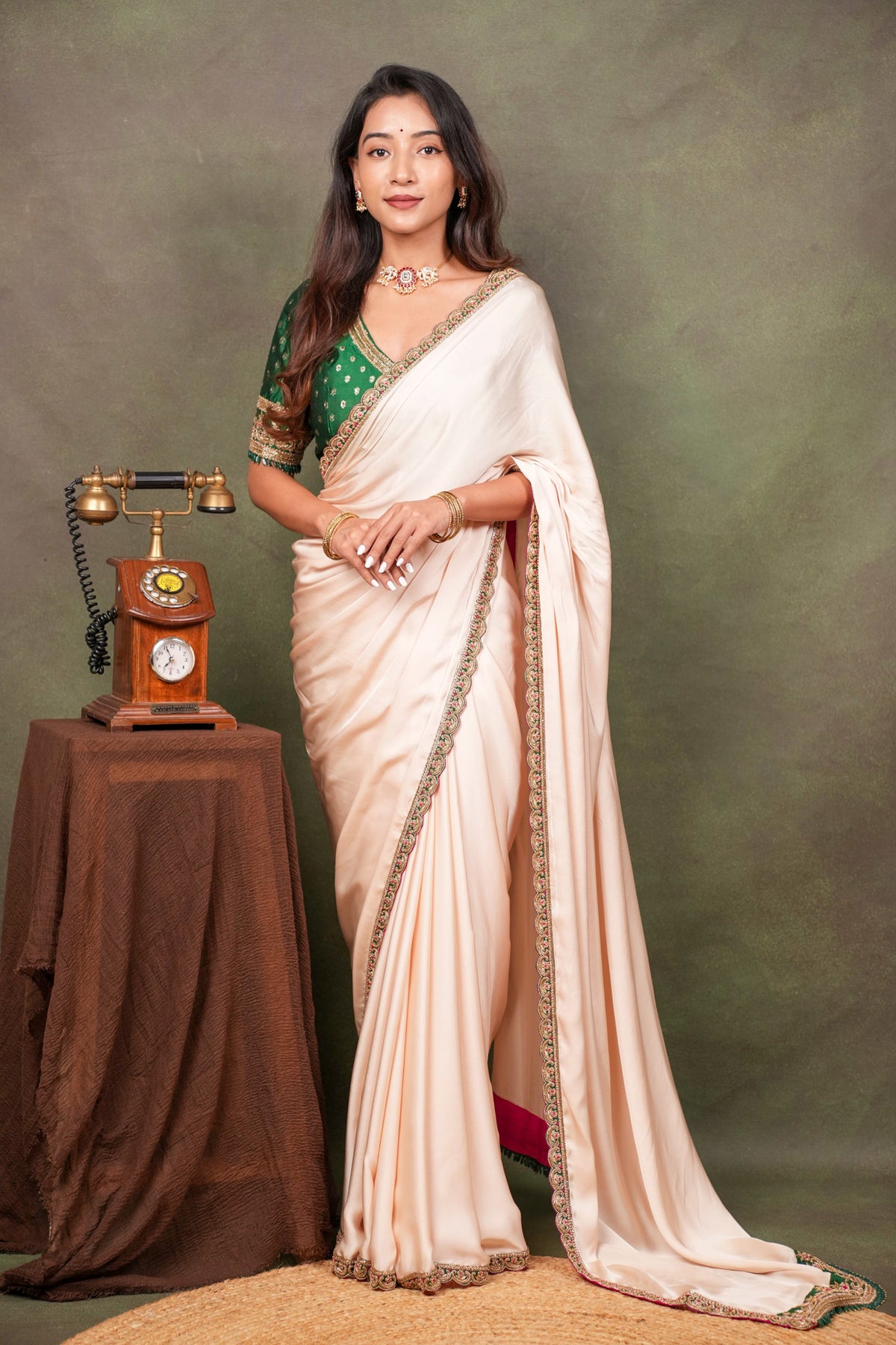Peach Satin Saree with Green Embroidered Border