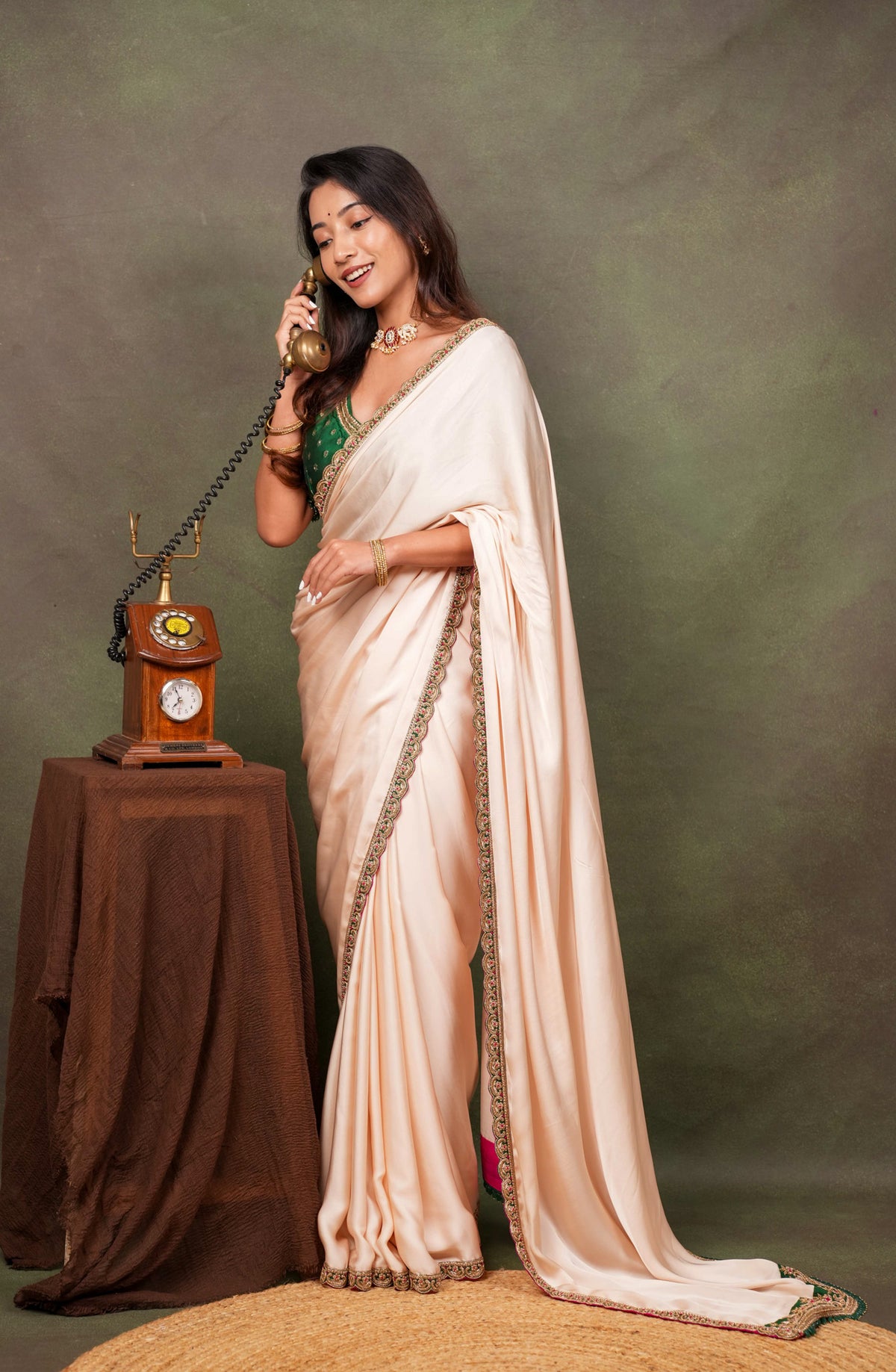 Peach Satin Saree with Green Embroidered Border