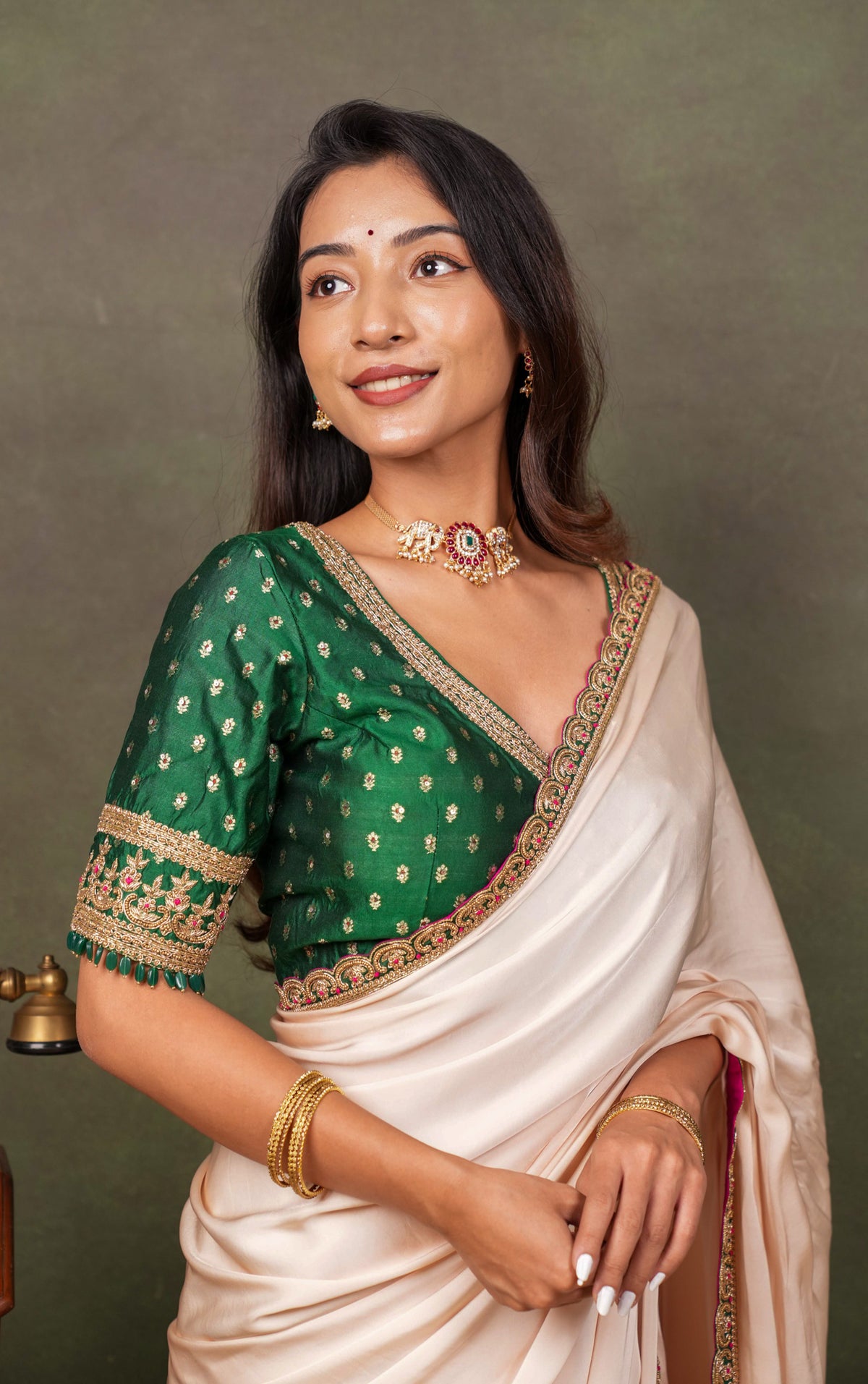 Peach Satin Saree with Green Embroidered Border