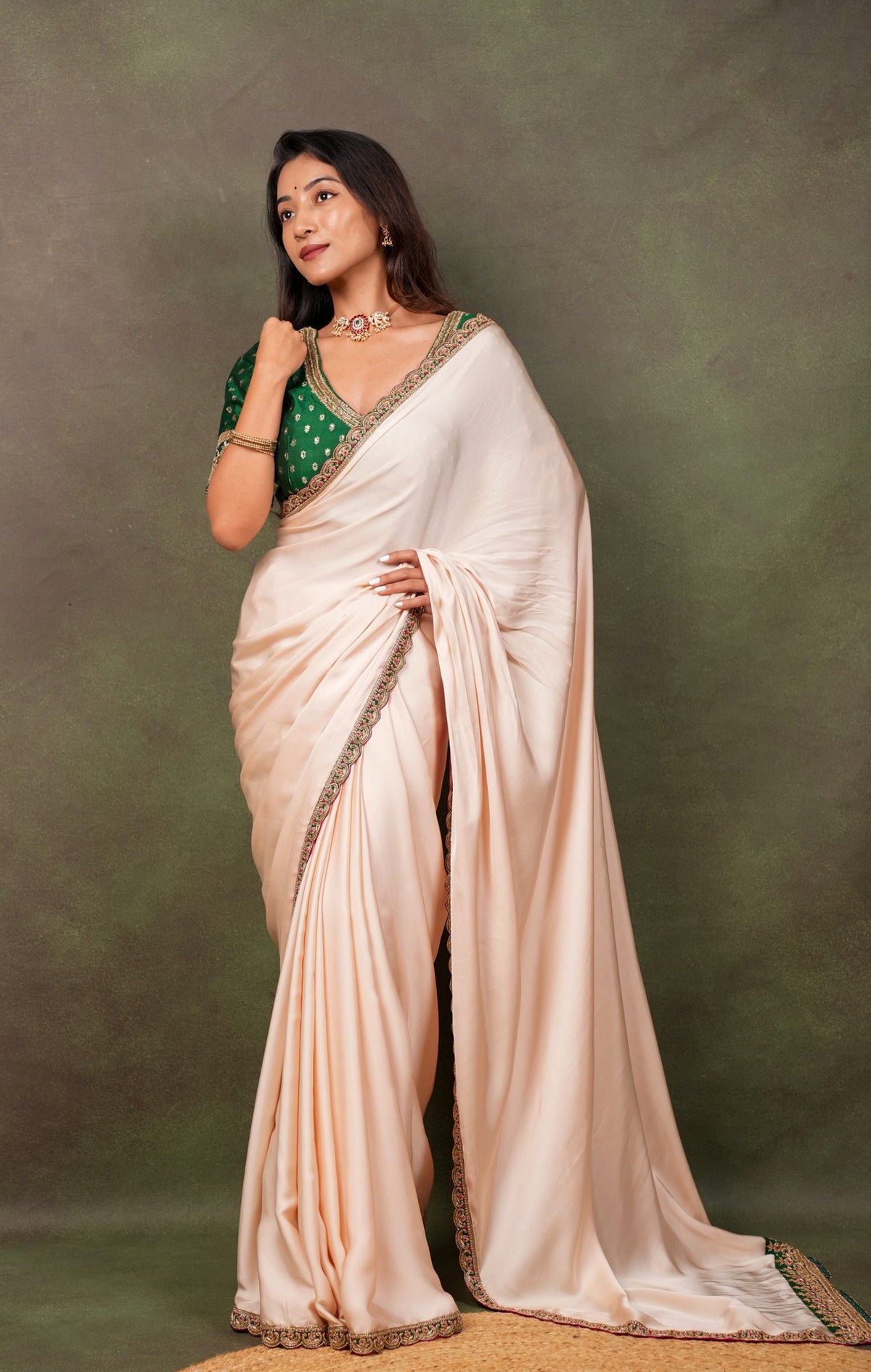 Peach Satin Saree with Green Embroidered Border