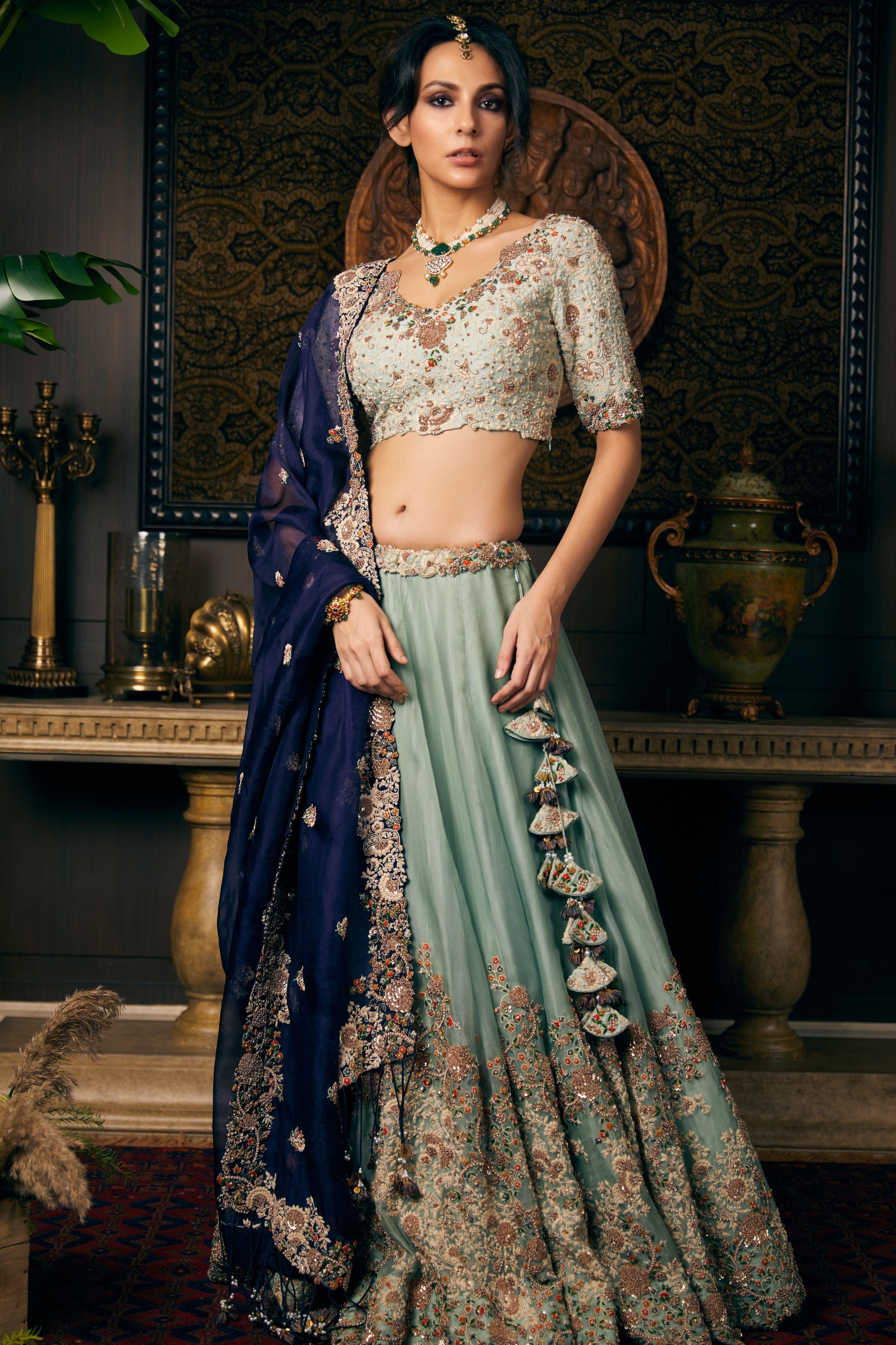 Aqua organza lehenga and silk blouse with contrast organza dupatta  Mokshaa