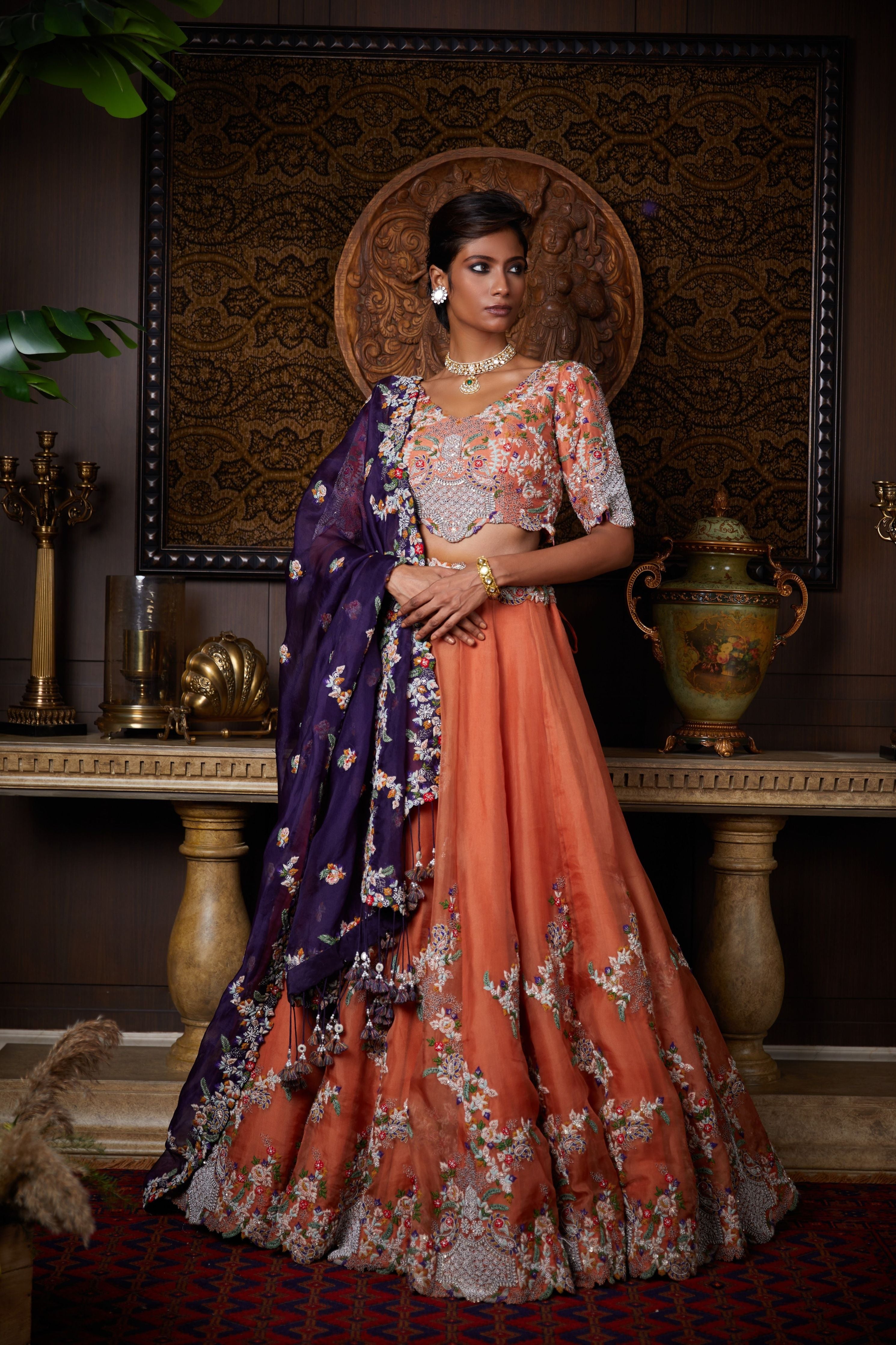 Rust organza lehenga and aubergine organza dupatta with silk blouse  Mokshaa