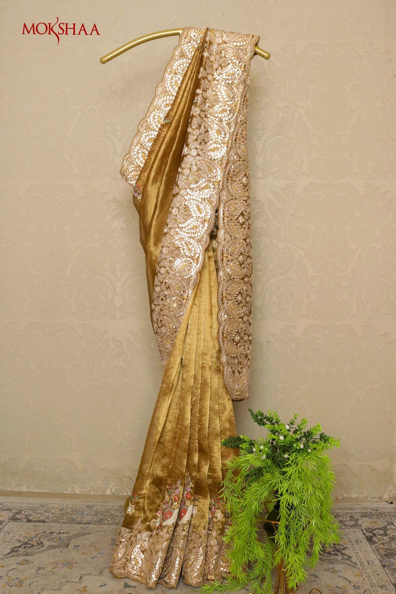 Gold Tissue Organza Saree with Gota & French Knot Work.