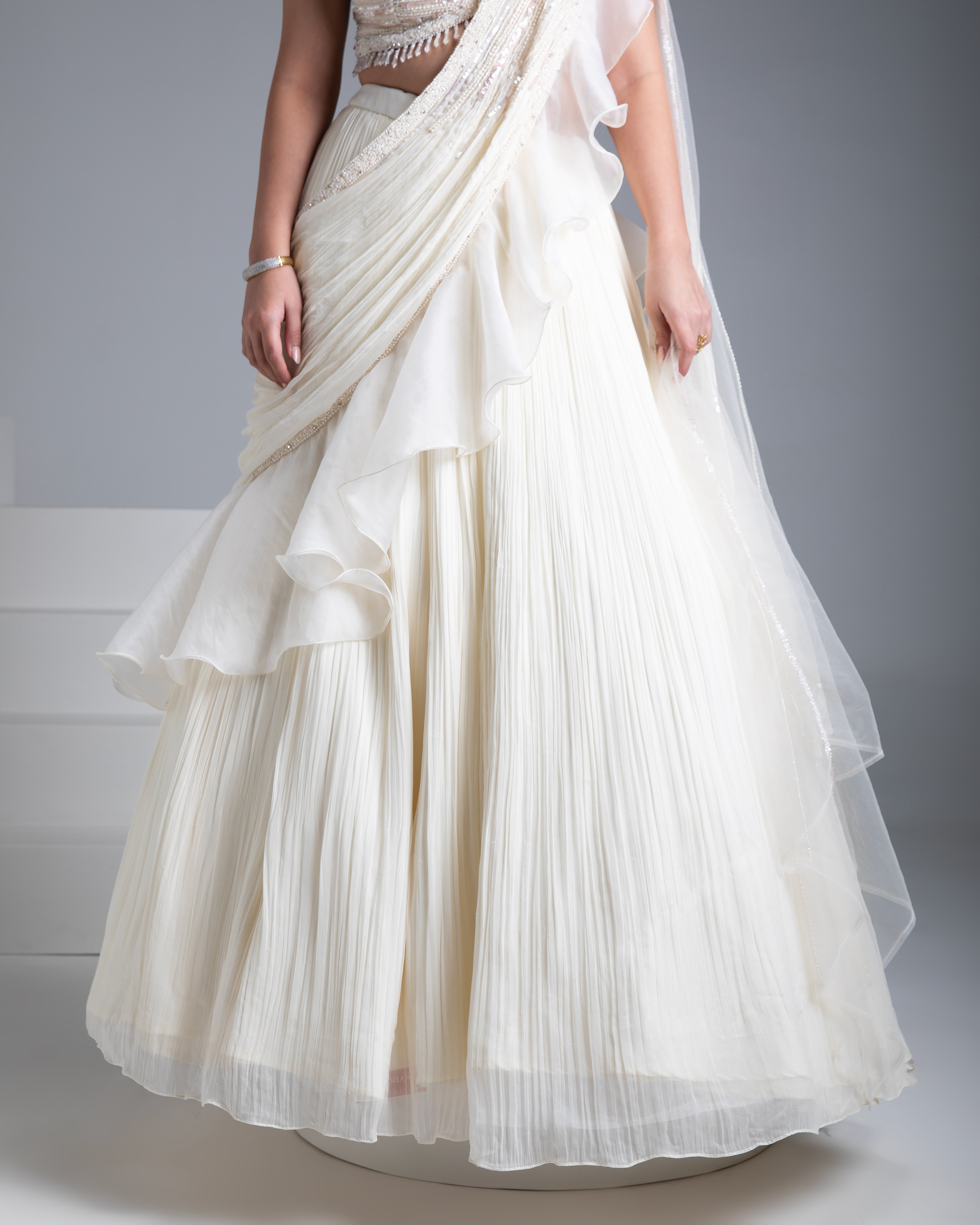 Ivory Georgette Pleated Lehenga Set with Bead and Pearl Embroidered Blouse - Mokshaa