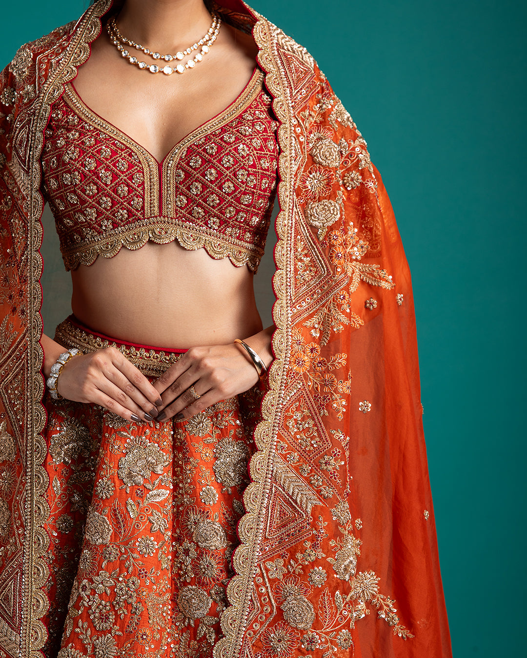 Crimson and Orange Embroidered Bridal Lehenga - Mokshaa