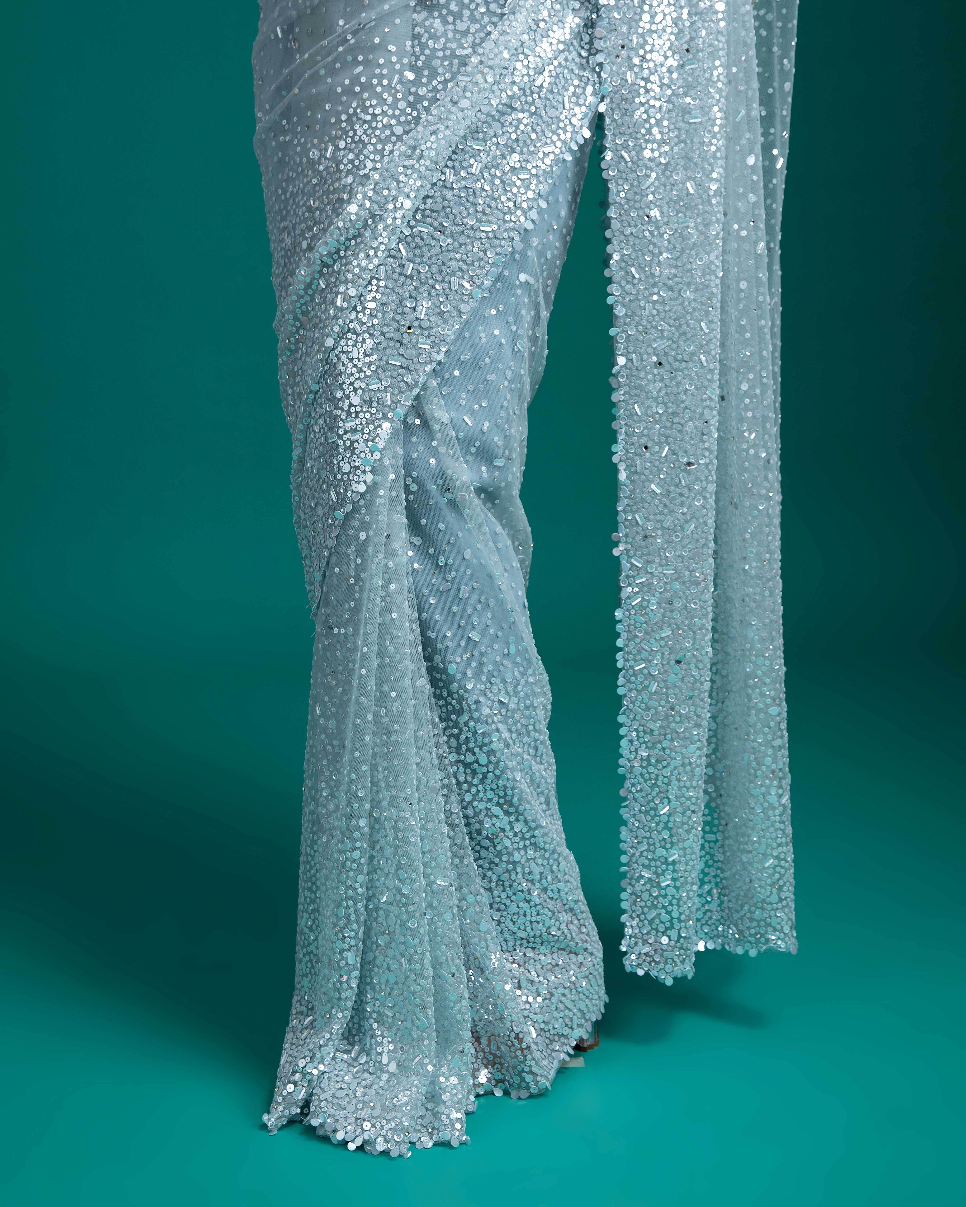 Ice Blue Sequined Net Saree - Mokshaa