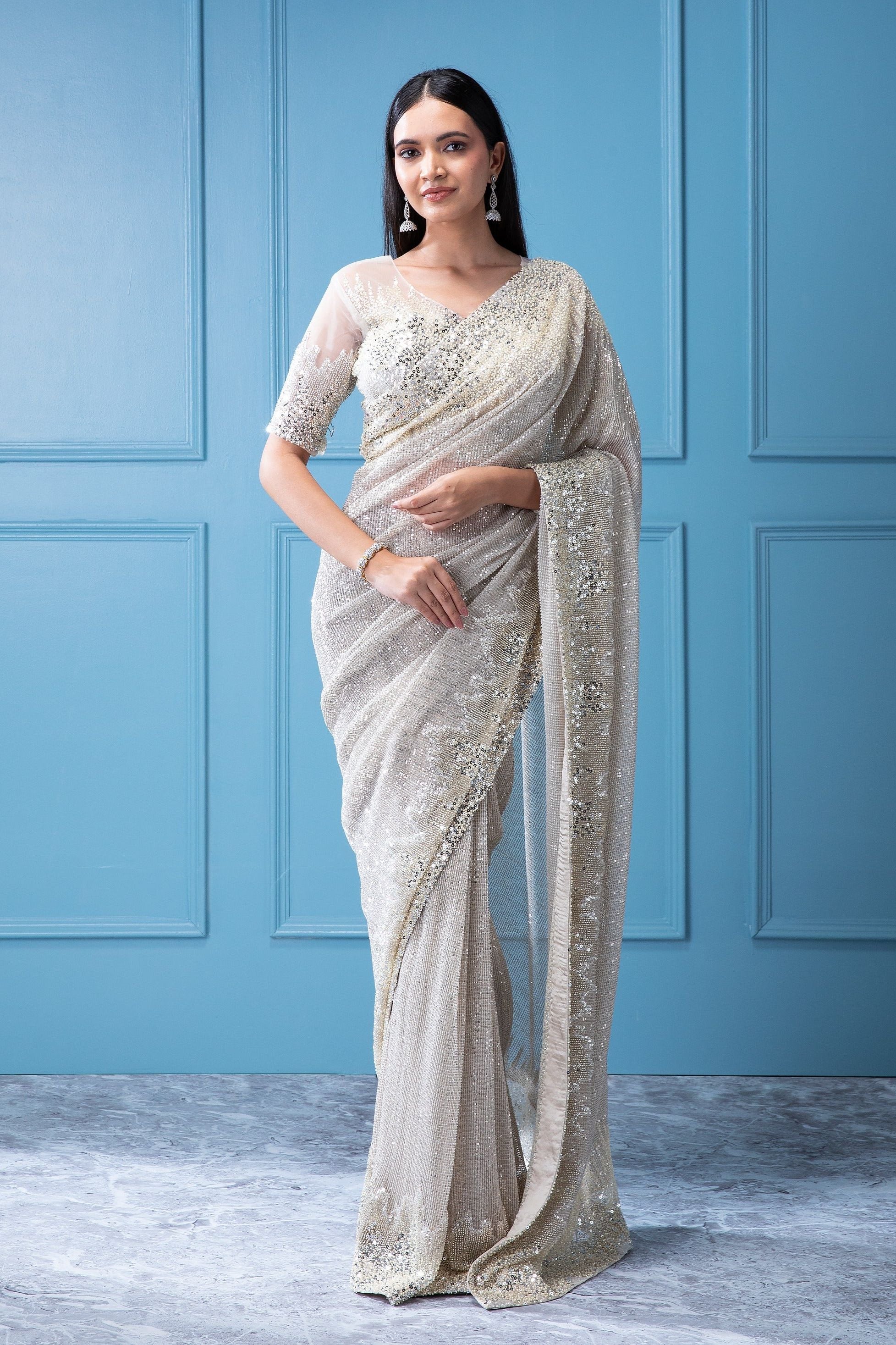 Off-White Georgette Saree with Water Sequins and Pearl Border - Mokshaa