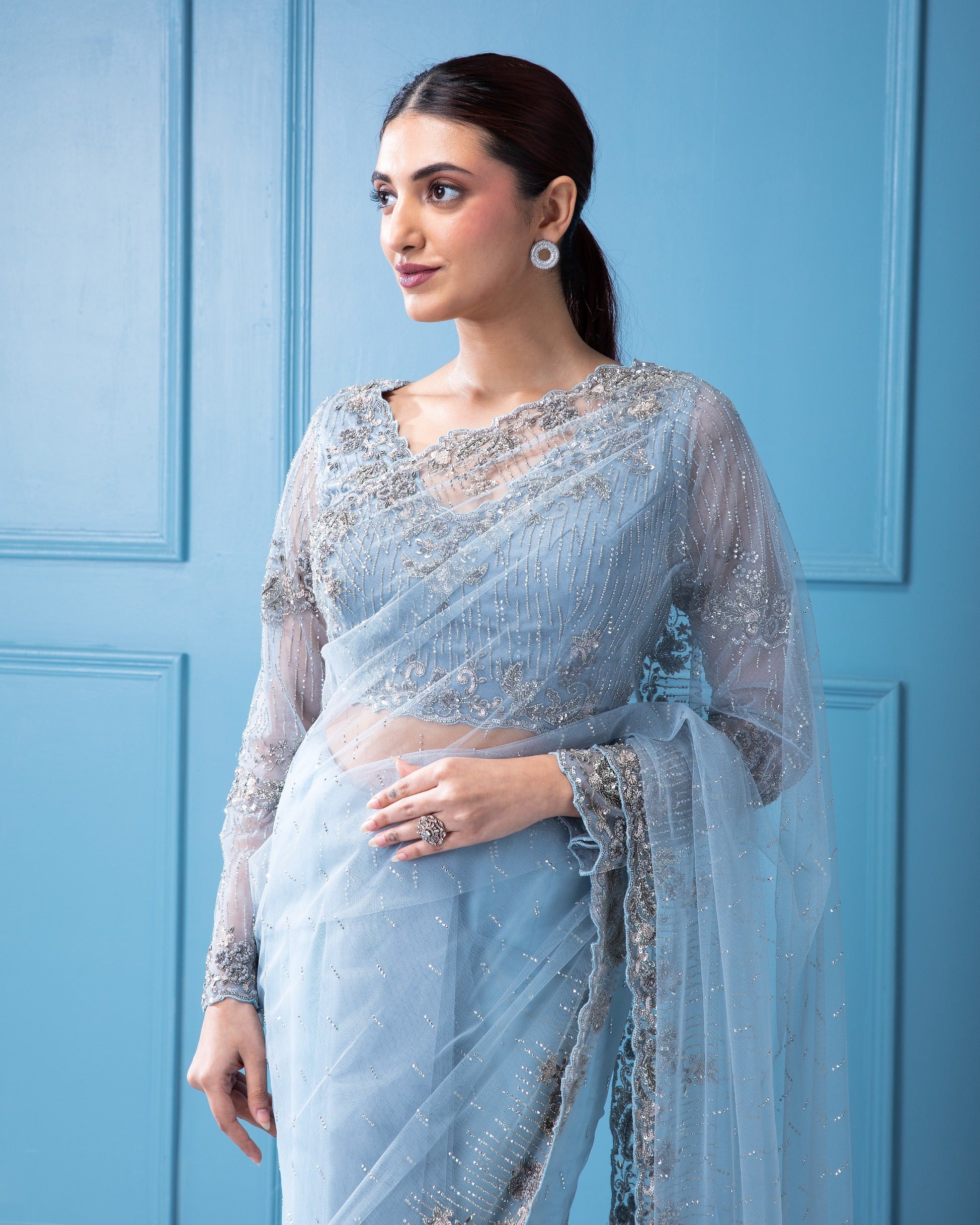 Soft Pastel Blue Net Saree with Sequins, Stones, and Zardosi Work - Mokshaa