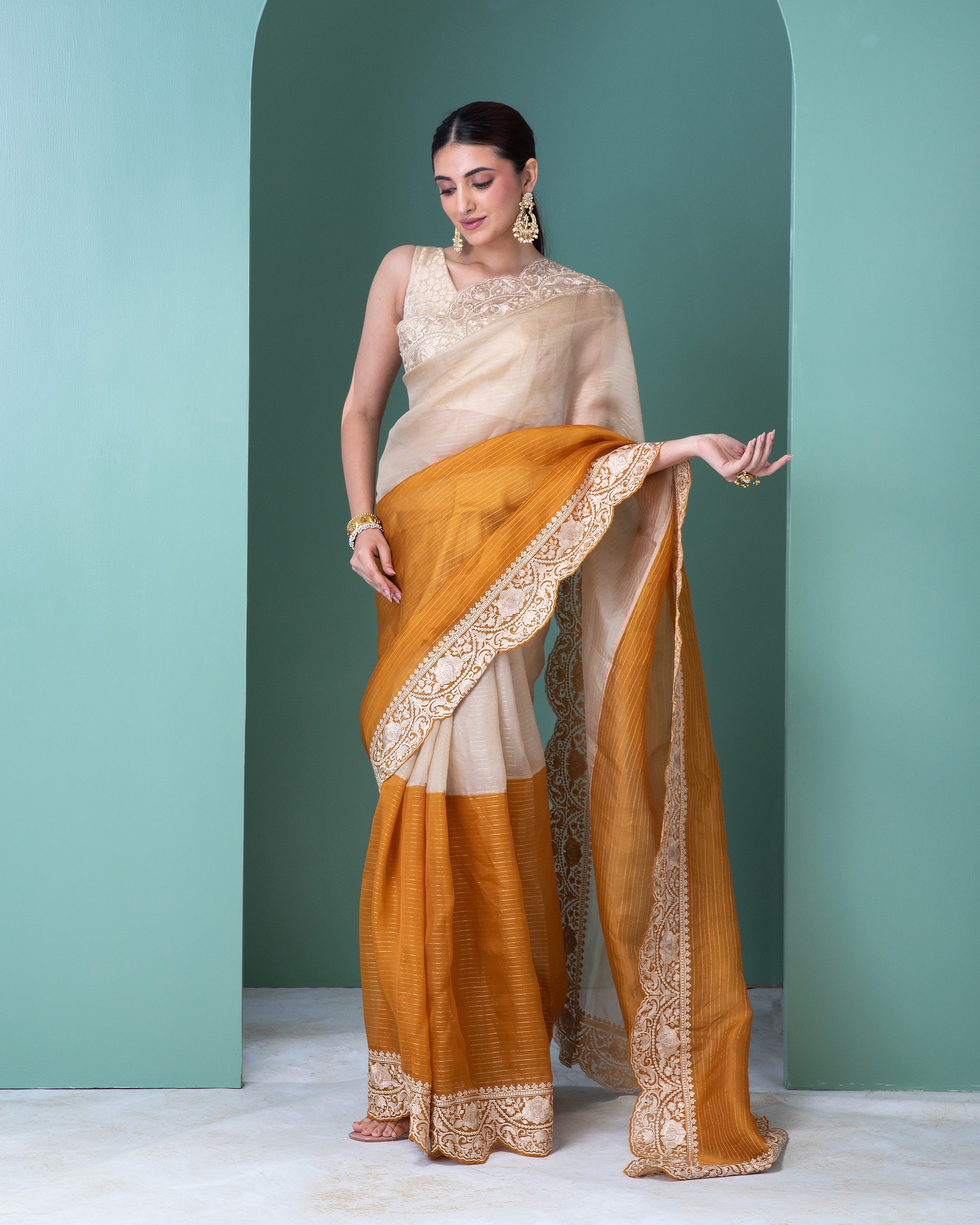 Off-White and Mustard Orange Organza Saree with Thread Embroidery and Scallop Border - Mokshaa