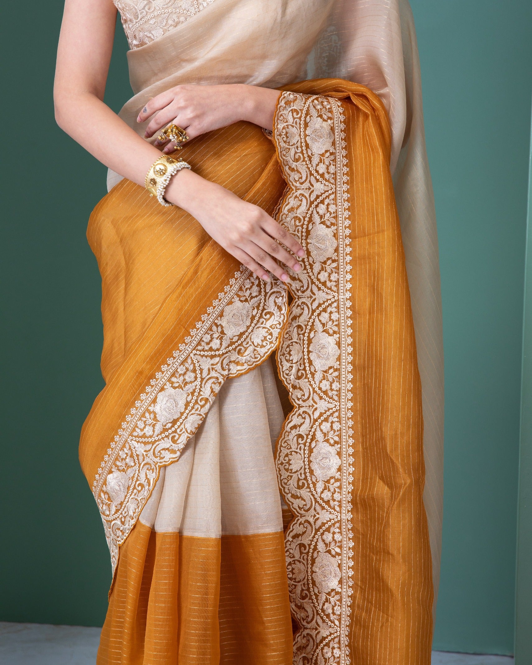 Off-White and Mustard Orange Organza Saree with Thread Embroidery and Scallop Border - Mokshaa