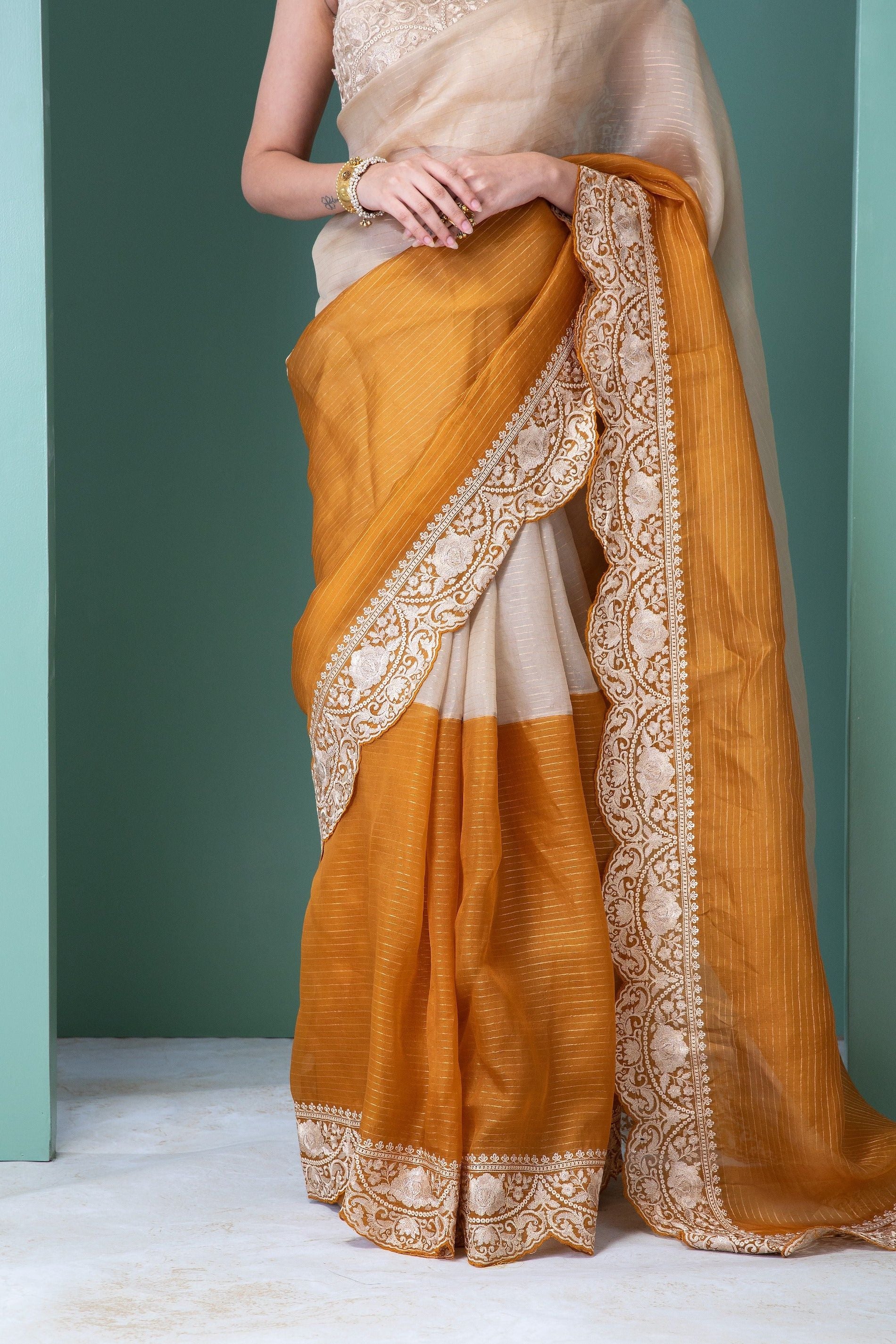 Off-White and Mustard Orange Organza Saree with Thread Embroidery and Scallop Border - Mokshaa