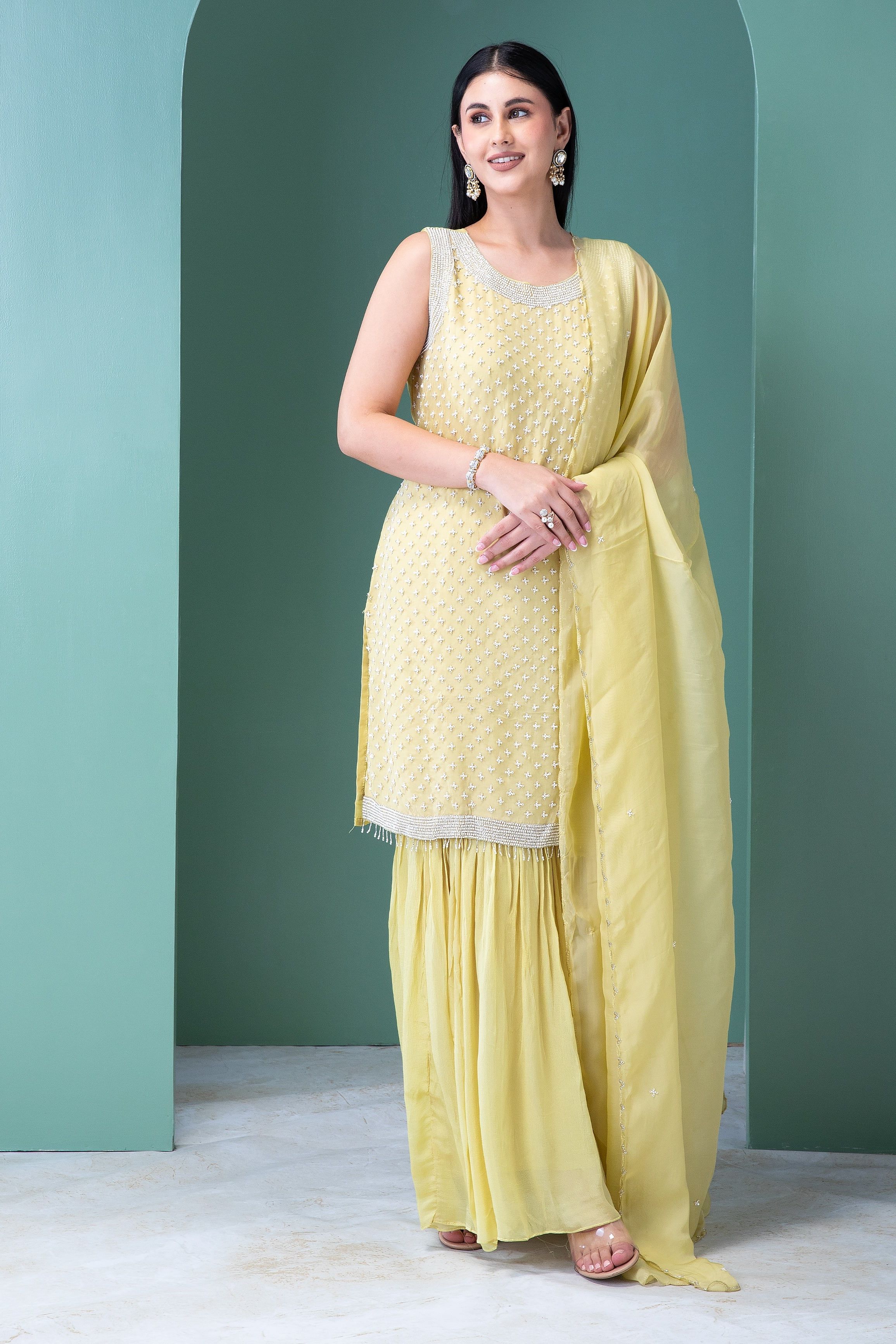 Elegant Pastel Yellow Georgette Sharara Set with Sequins and Pearl Embellishments - Mokshaa