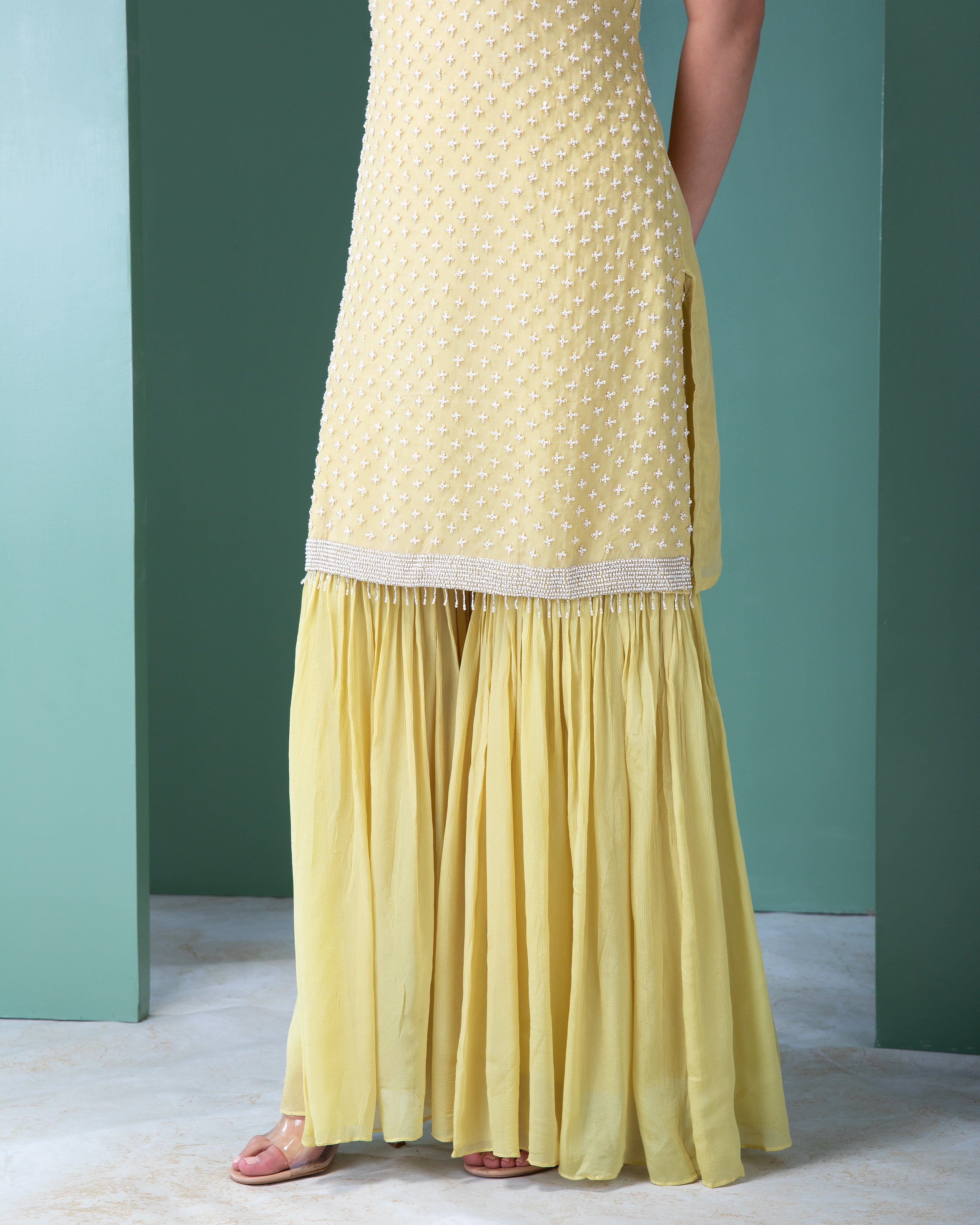 Elegant Pastel Yellow Georgette Sharara Set with Sequins and Pearl Embellishments - Mokshaa