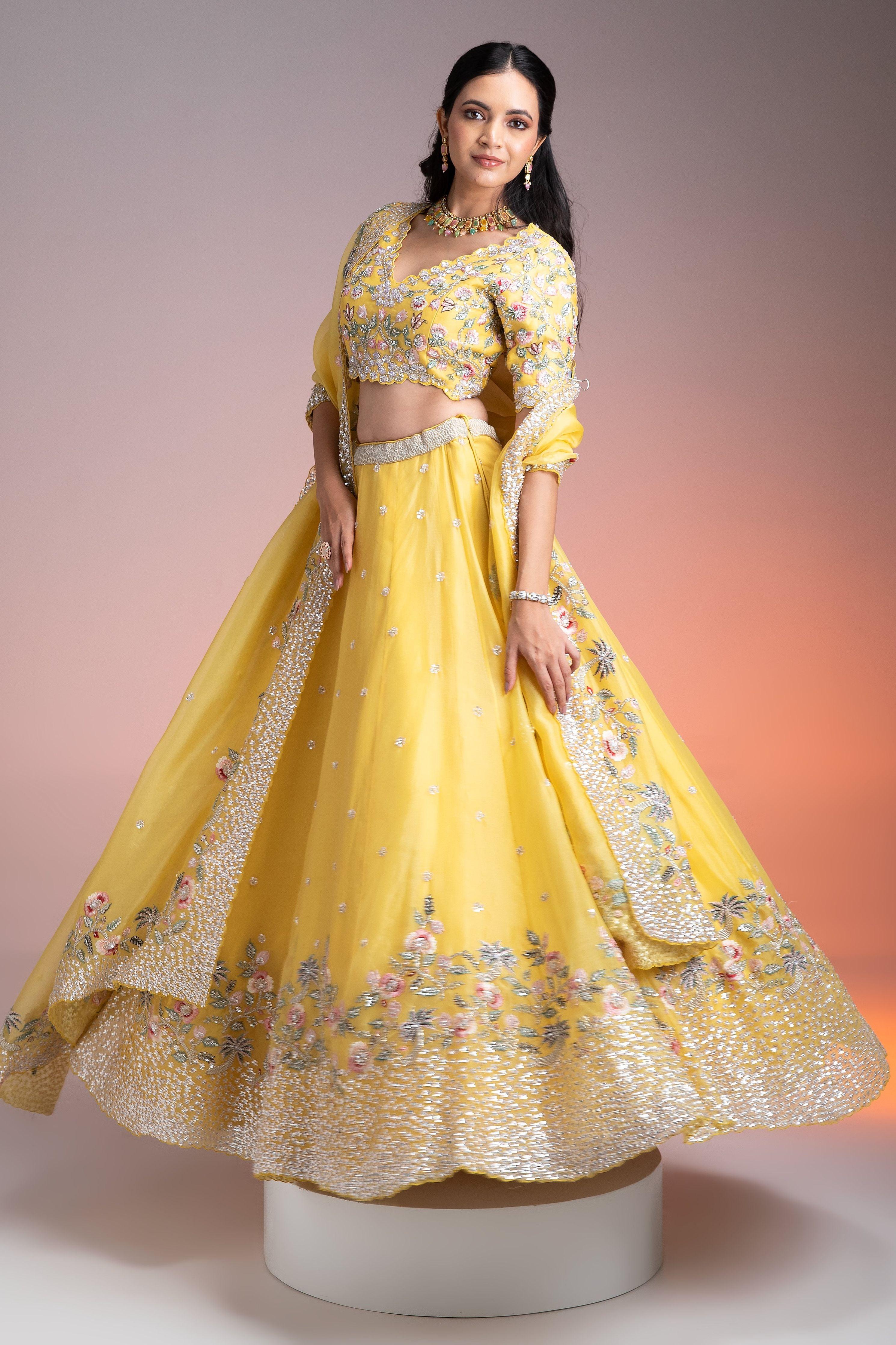 Vibrant Yellow Organza Lehenga with Multicolor Floral Threadwork and Sequins  Mokshaa