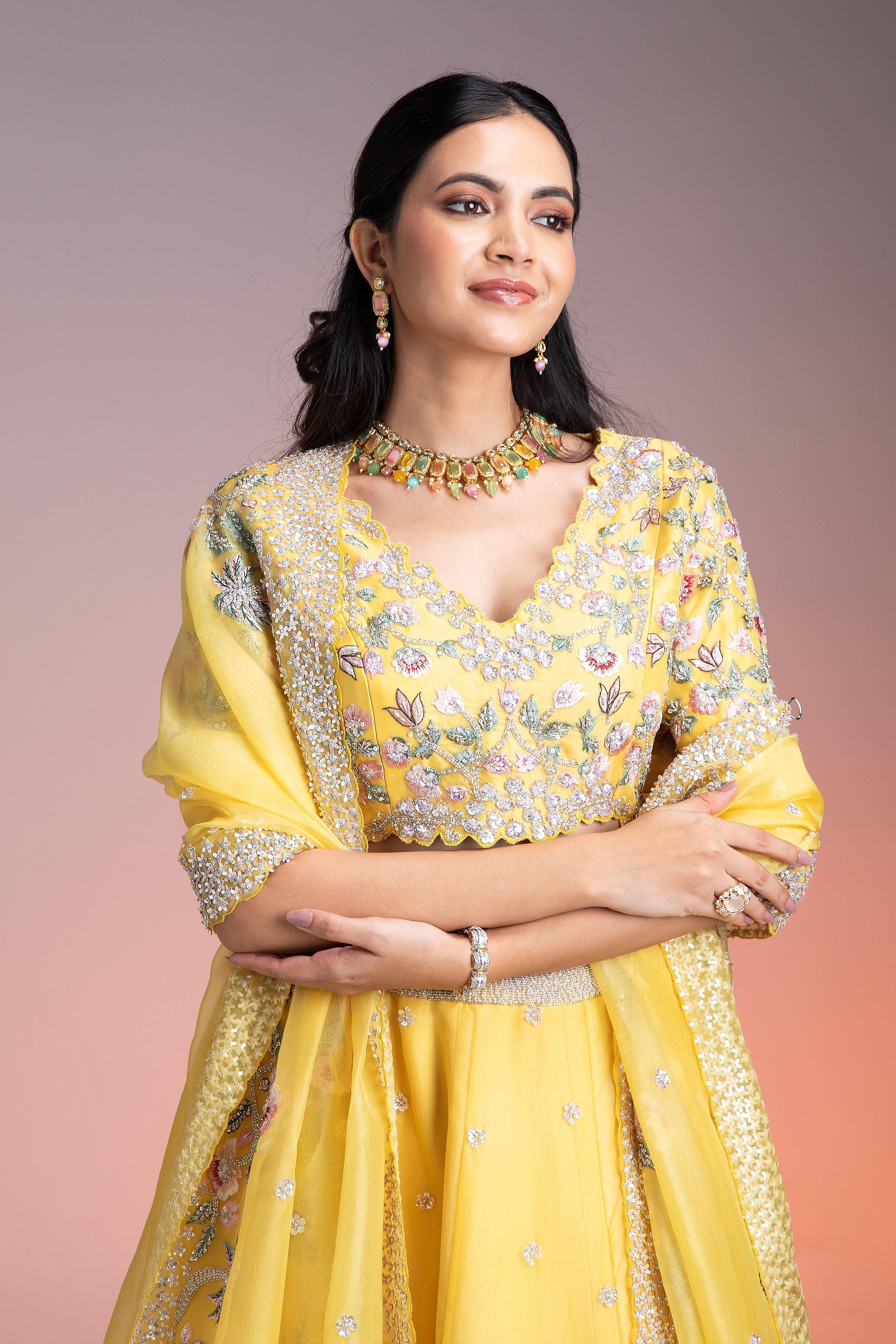 Vibrant Yellow Organza Lehenga with Multicolor Floral Threadwork and Sequins  Mokshaa