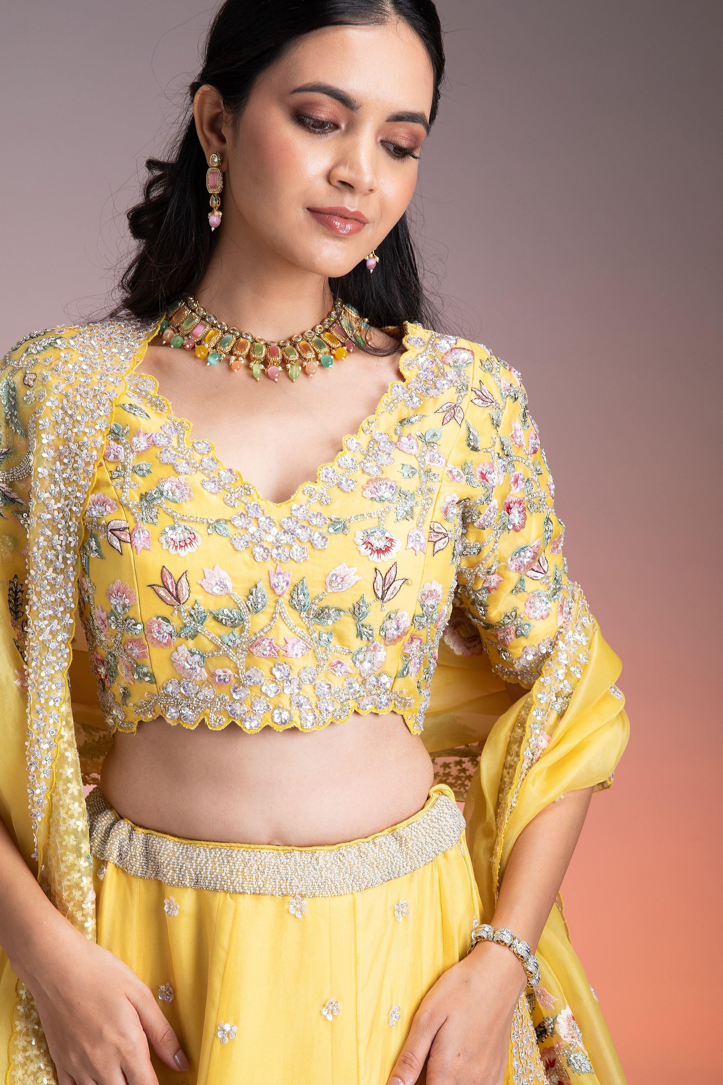 Vibrant Yellow Organza Lehenga with Multicolor Floral Threadwork and Sequins  Mokshaa