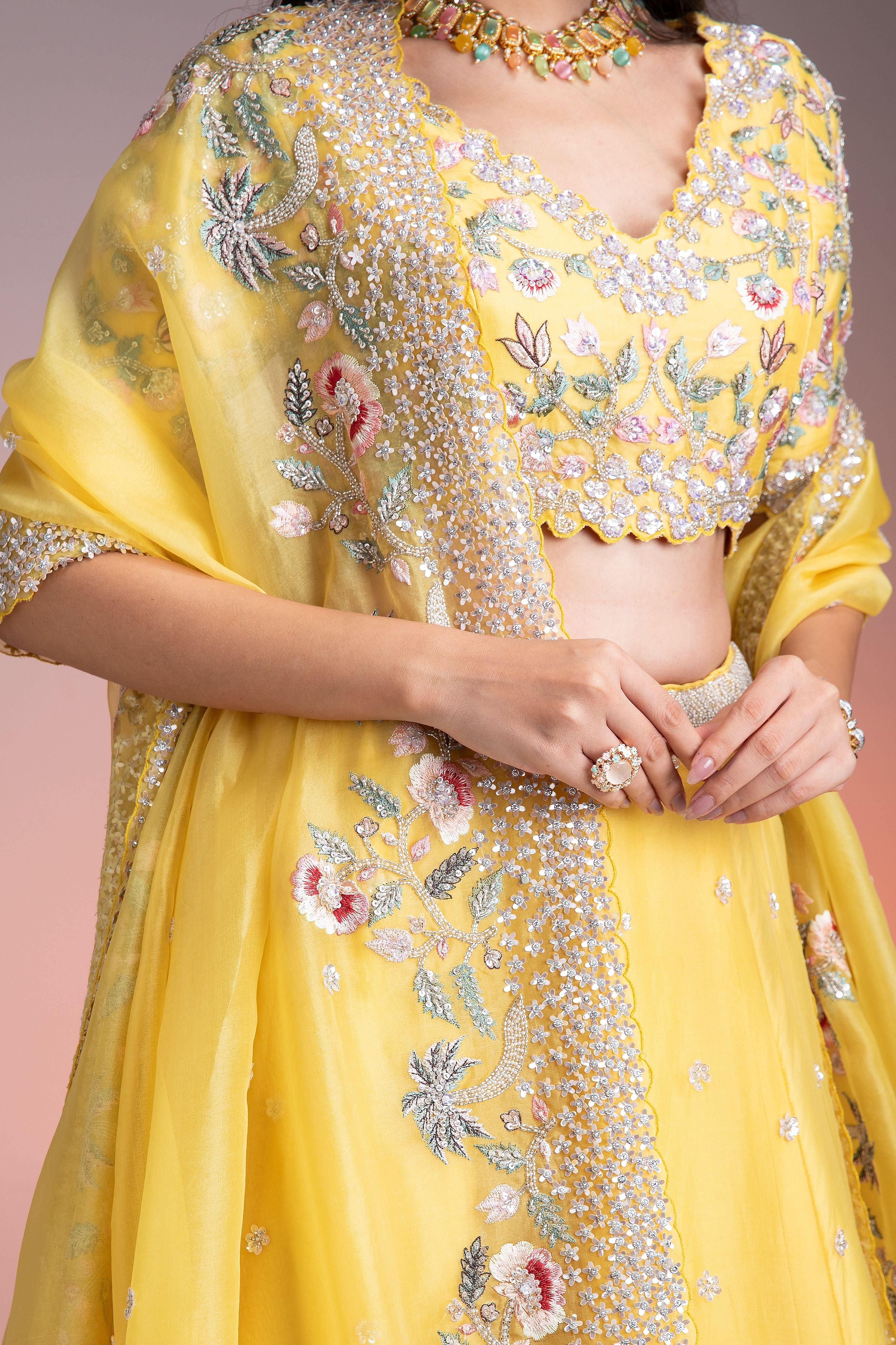 Vibrant Yellow Organza Lehenga with Multicolor Floral Threadwork and Sequins  Mokshaa