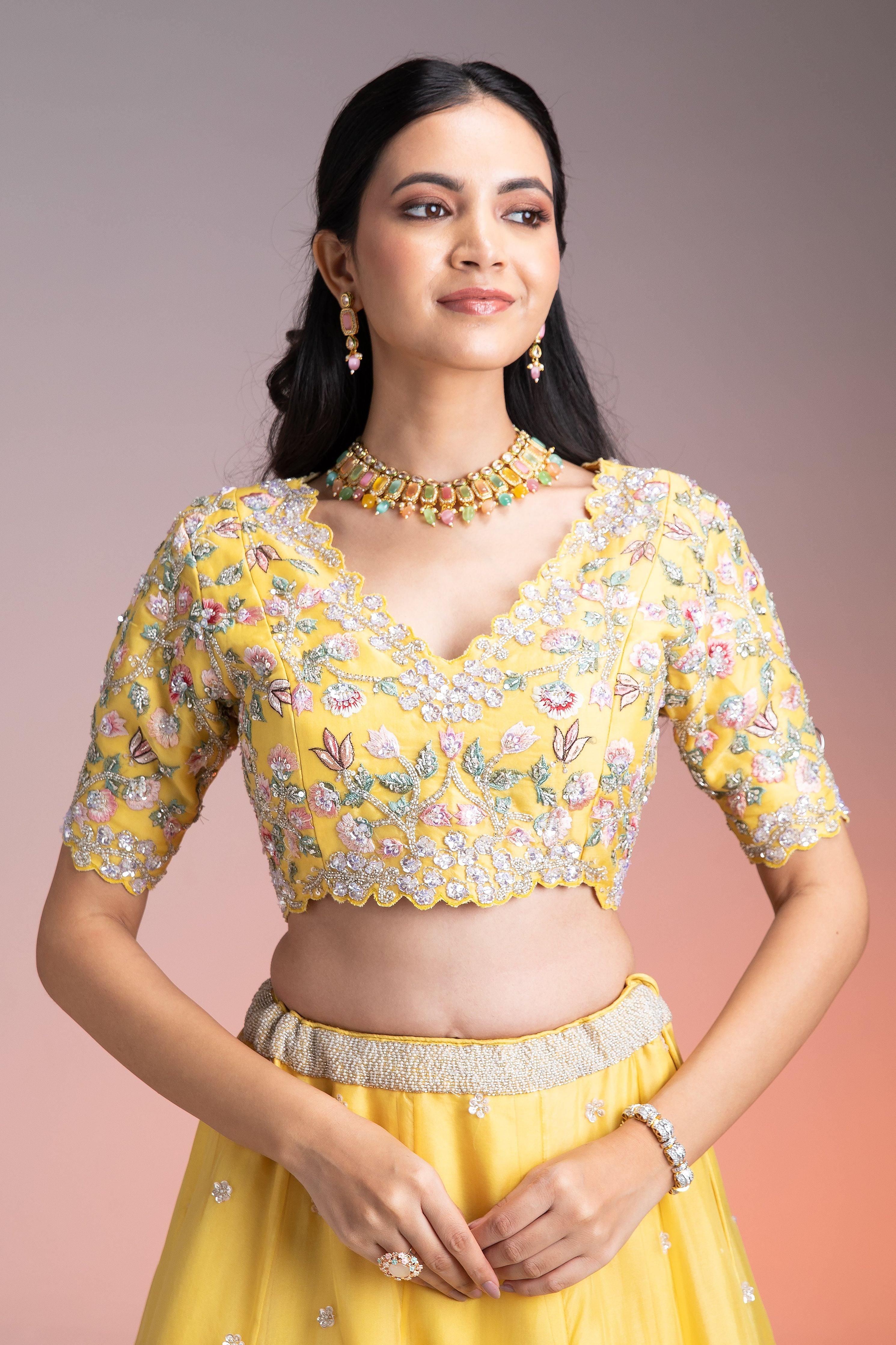 Vibrant Yellow Organza Lehenga with Multicolor Floral Threadwork and Sequins  Mokshaa