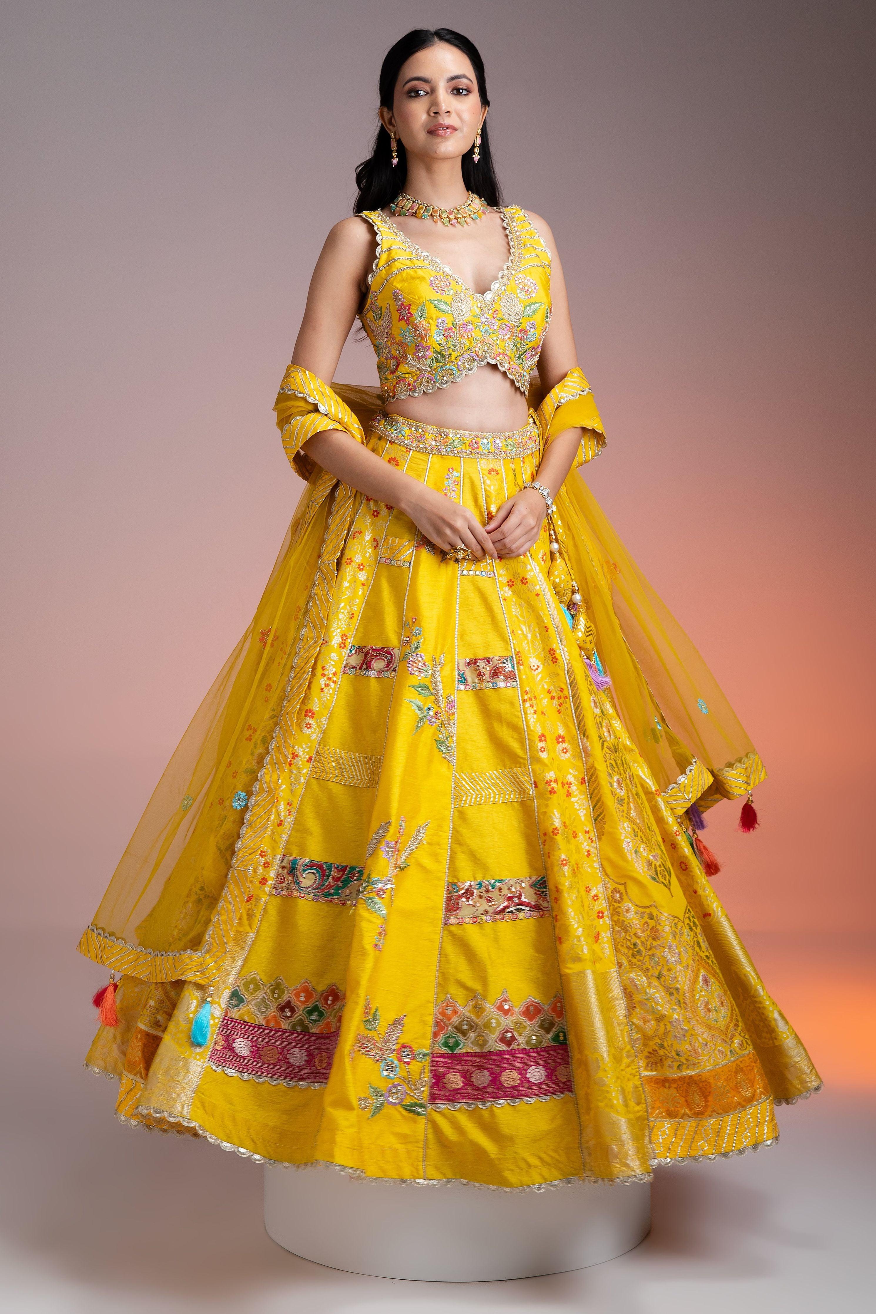 Bright Yellow Silk Lehenga with Multicolor Floral Threadwork and Net Dupatta  Mokshaa