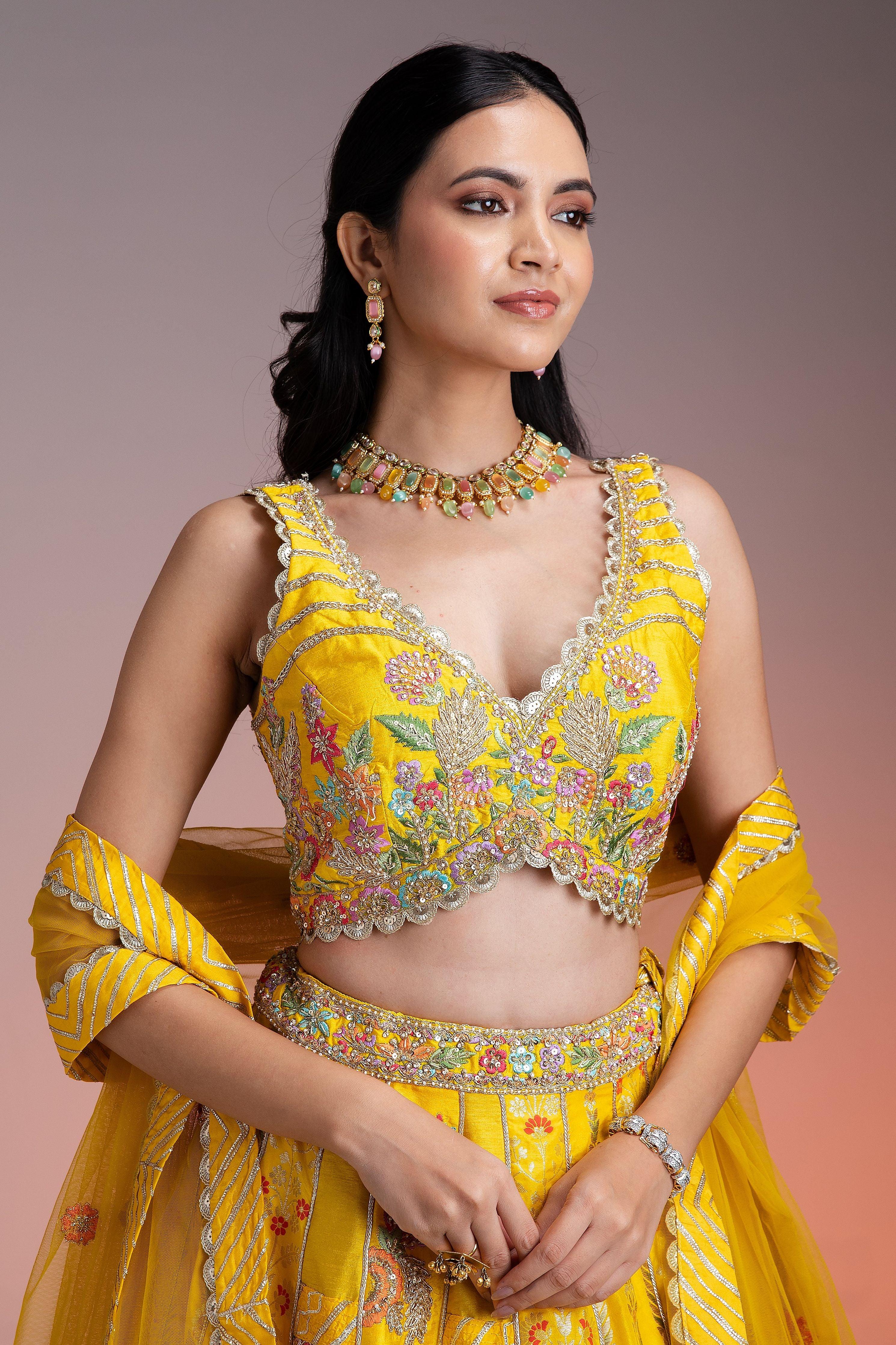 Bright Yellow Silk Lehenga with Multicolor Floral Threadwork and Net Dupatta  Mokshaa
