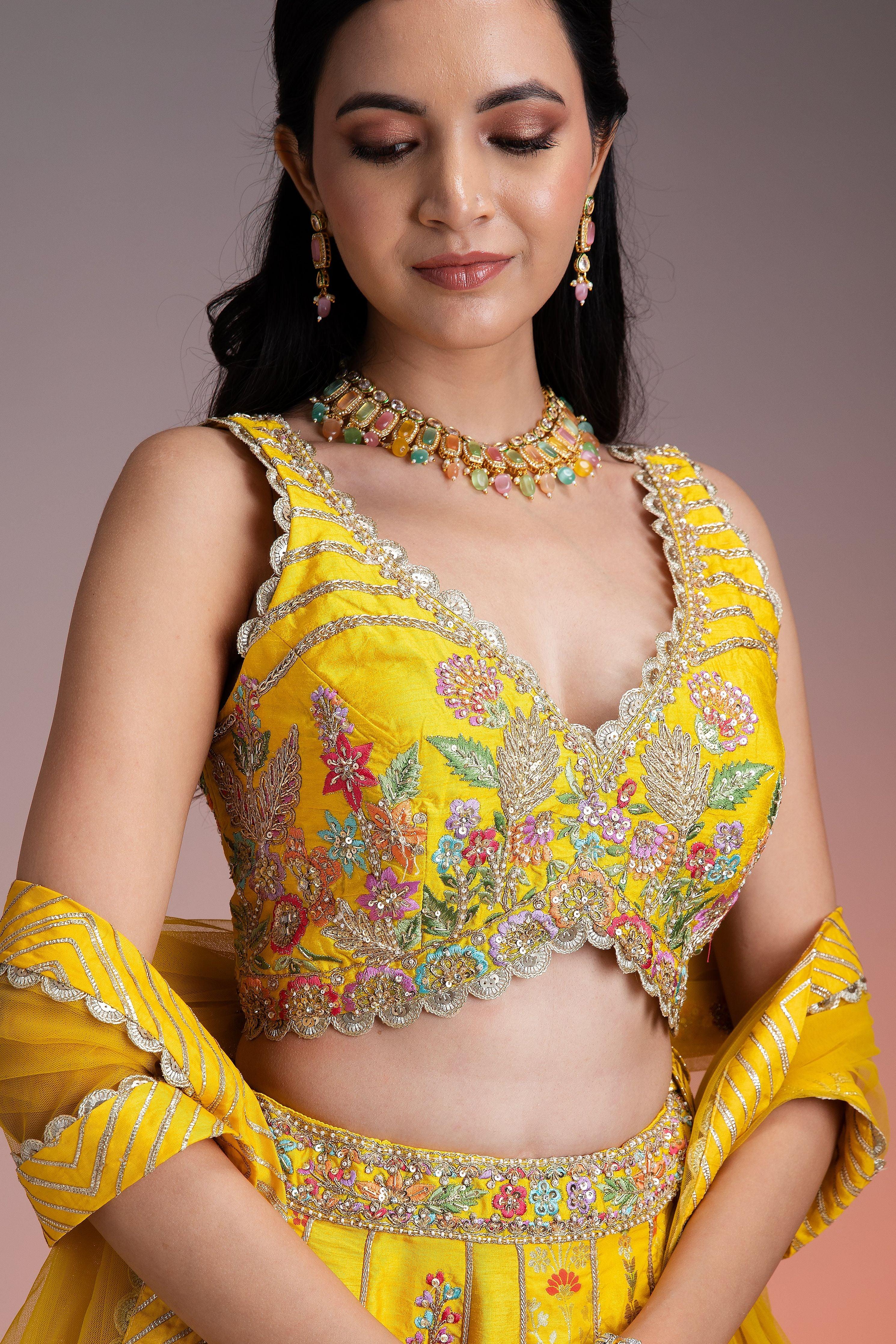 Bright Yellow Silk Lehenga with Multicolor Floral Threadwork and Net Dupatta  Mokshaa