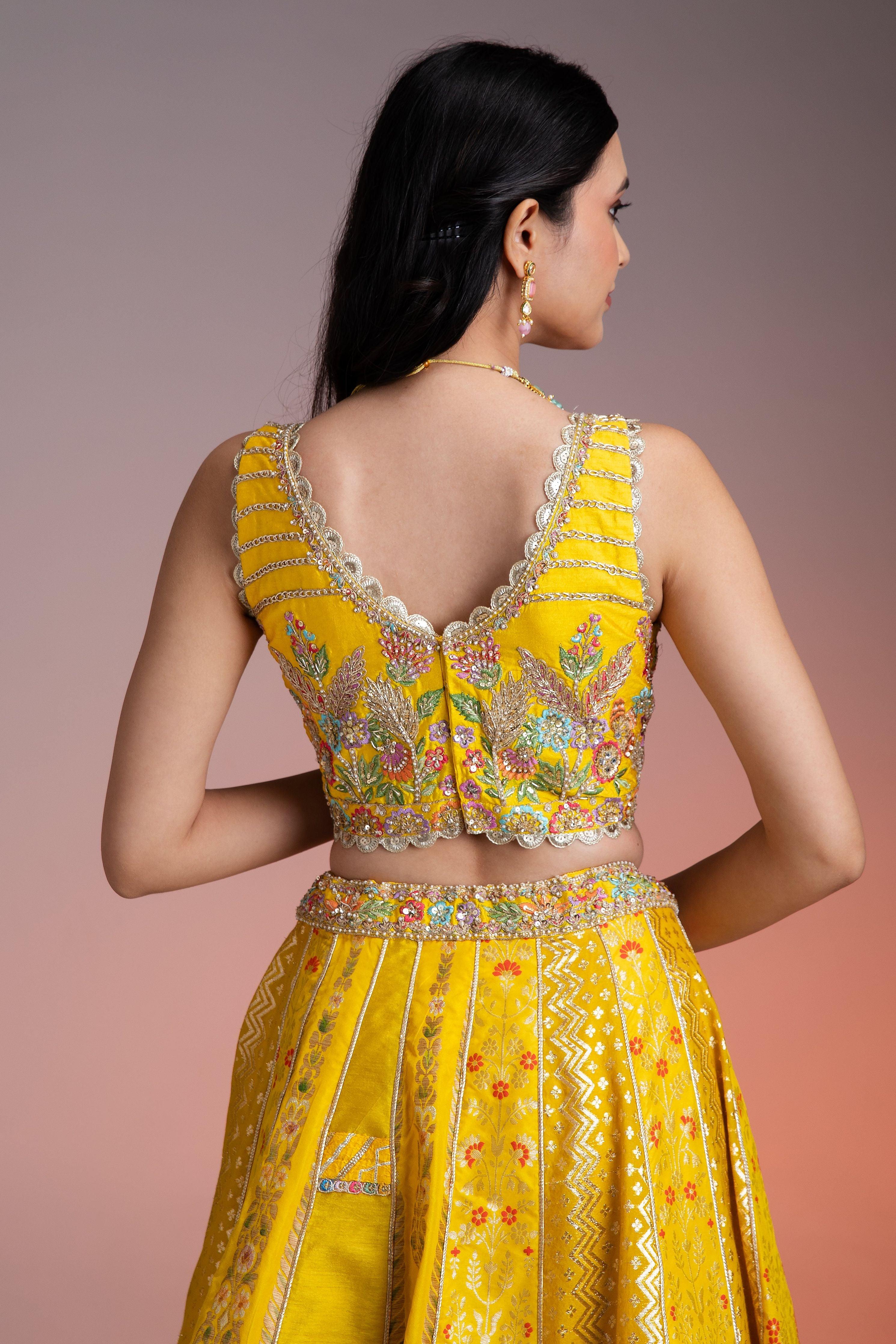 Bright Yellow Silk Lehenga with Multicolor Floral Threadwork and Net Dupatta  Mokshaa