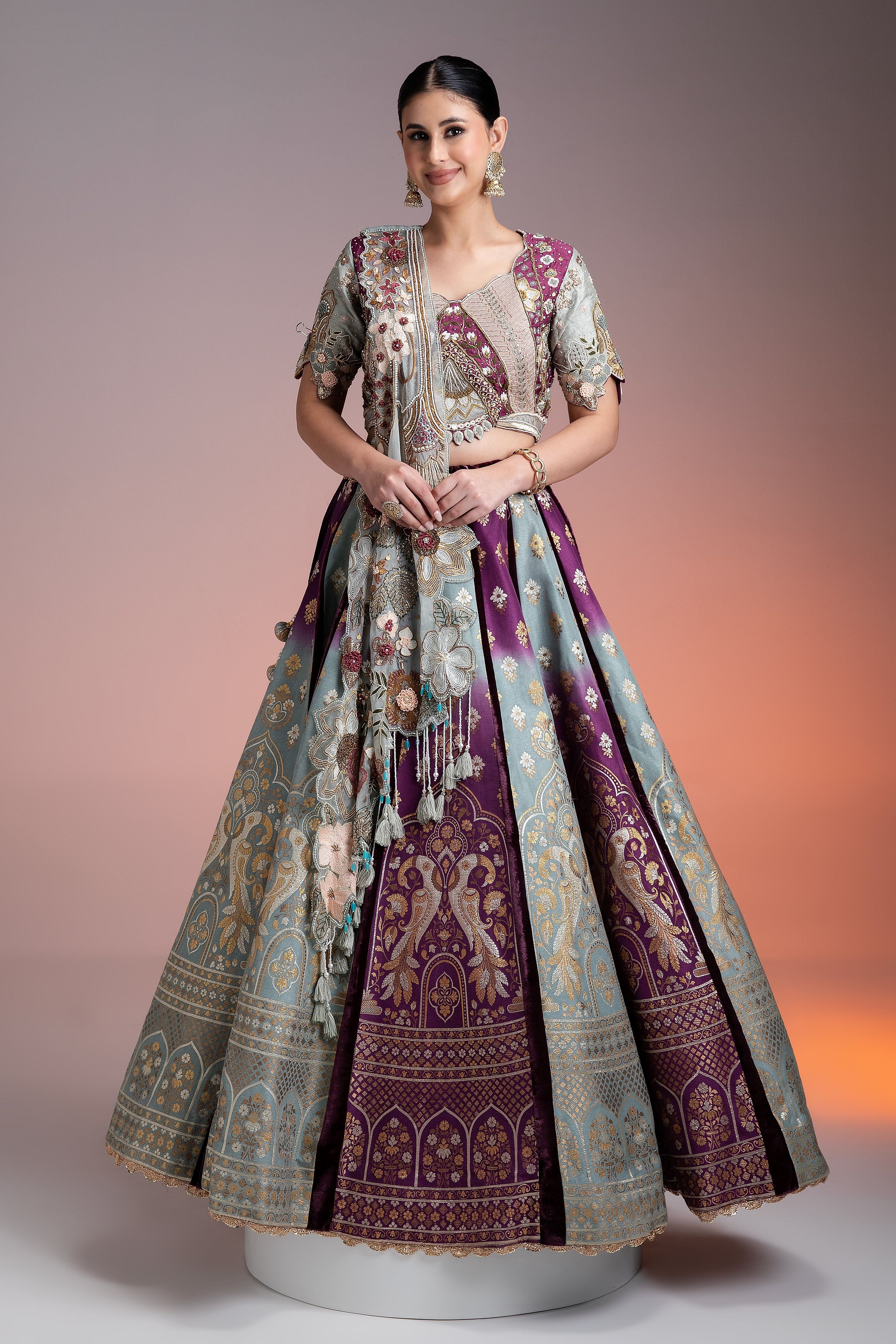 Silk Brocade Lehenga in Muted Pastels and Maroon with Floral Threadwork and Velvet Accents  Mokshaa