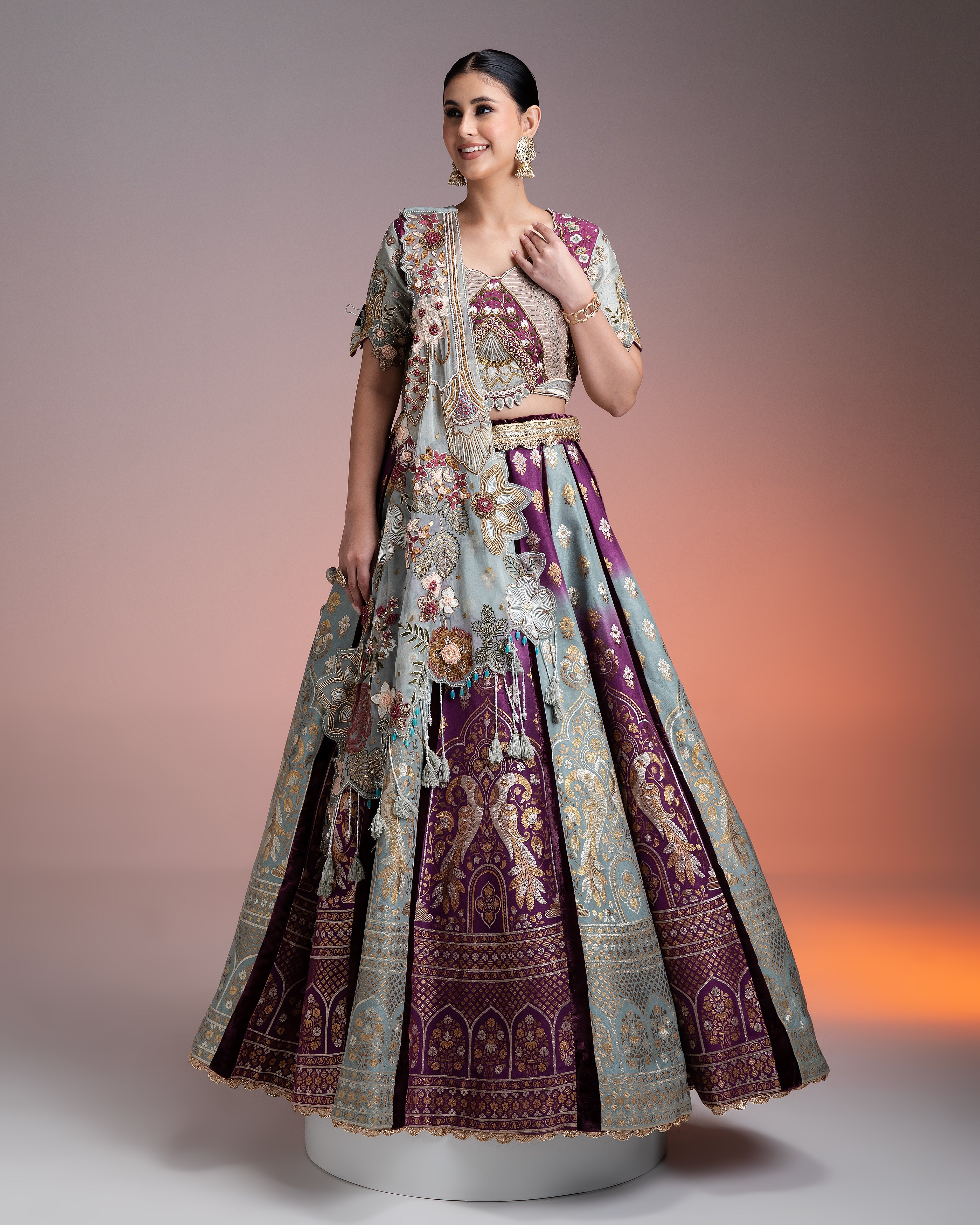 Silk Brocade Lehenga in Muted Pastels and Maroon with Floral Threadwork and Velvet Accents  Mokshaa