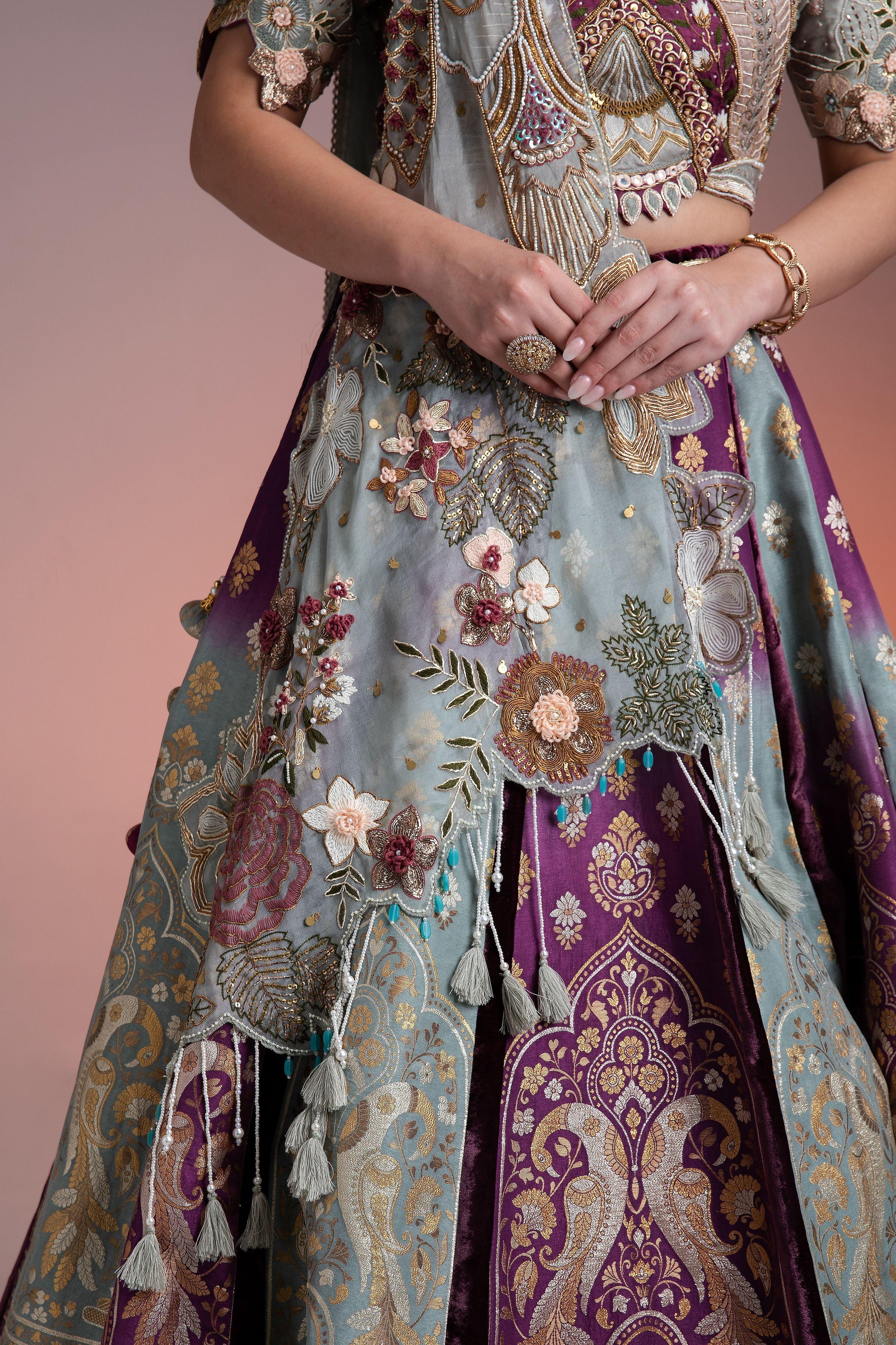 Silk Brocade Lehenga in Muted Pastels and Maroon with Floral Threadwork and Velvet Accents  Mokshaa