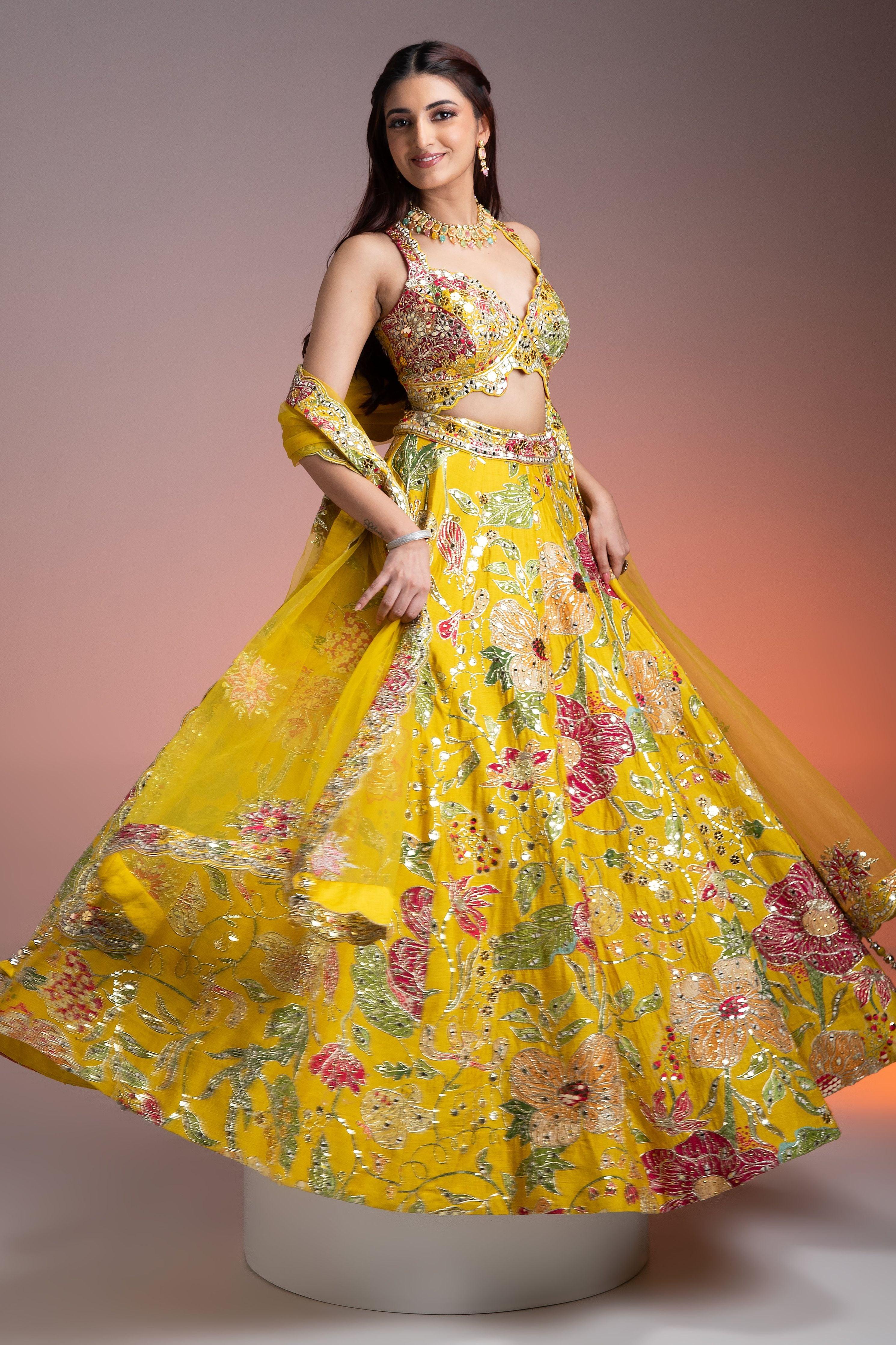 Bright Yellow Silk Lehenga with Multicolor Floral Print and Mirror Embellishments  Mokshaa
