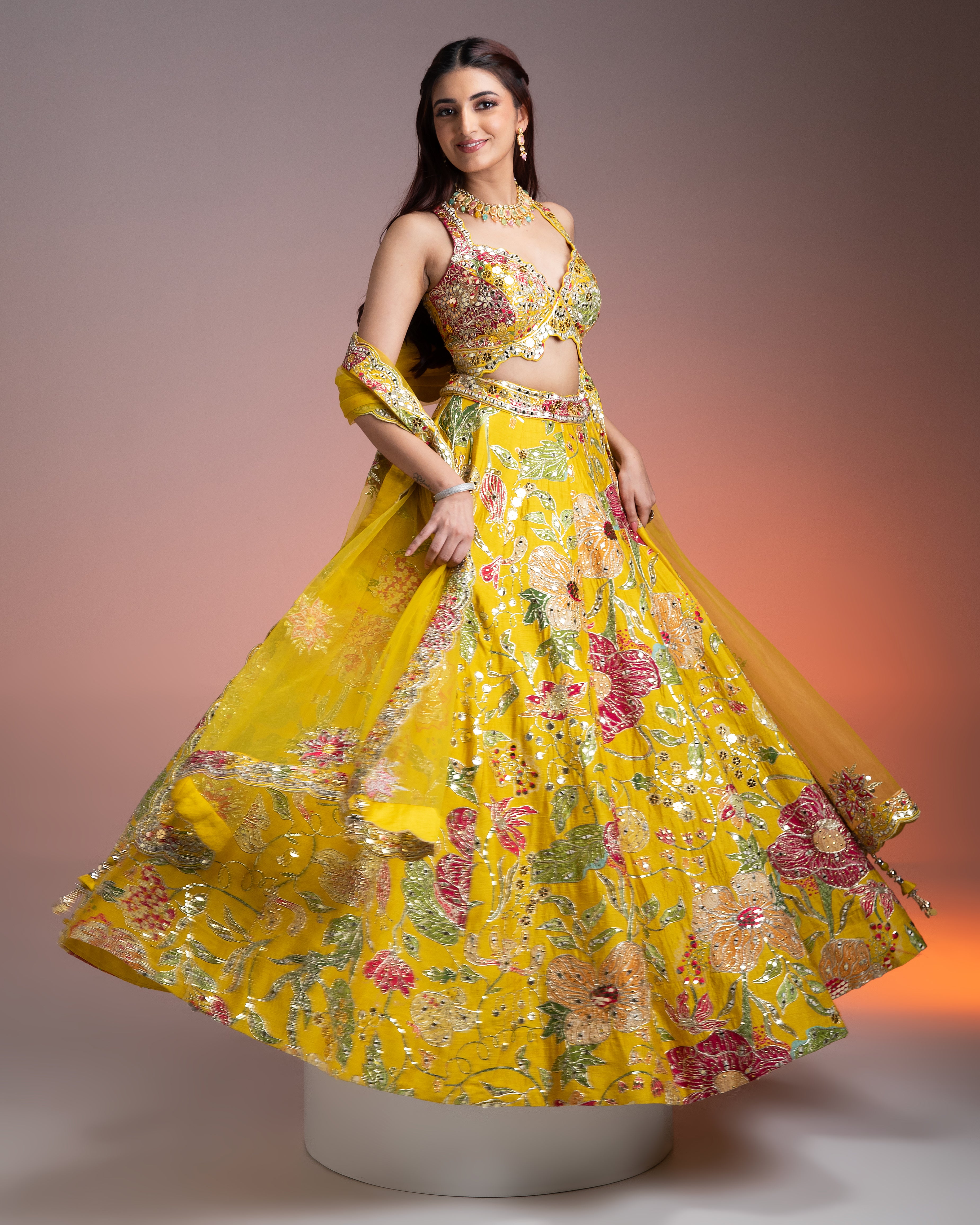 Bright Yellow Silk Lehenga with Multicolor Floral Print and Mirror Embellishments  Mokshaa