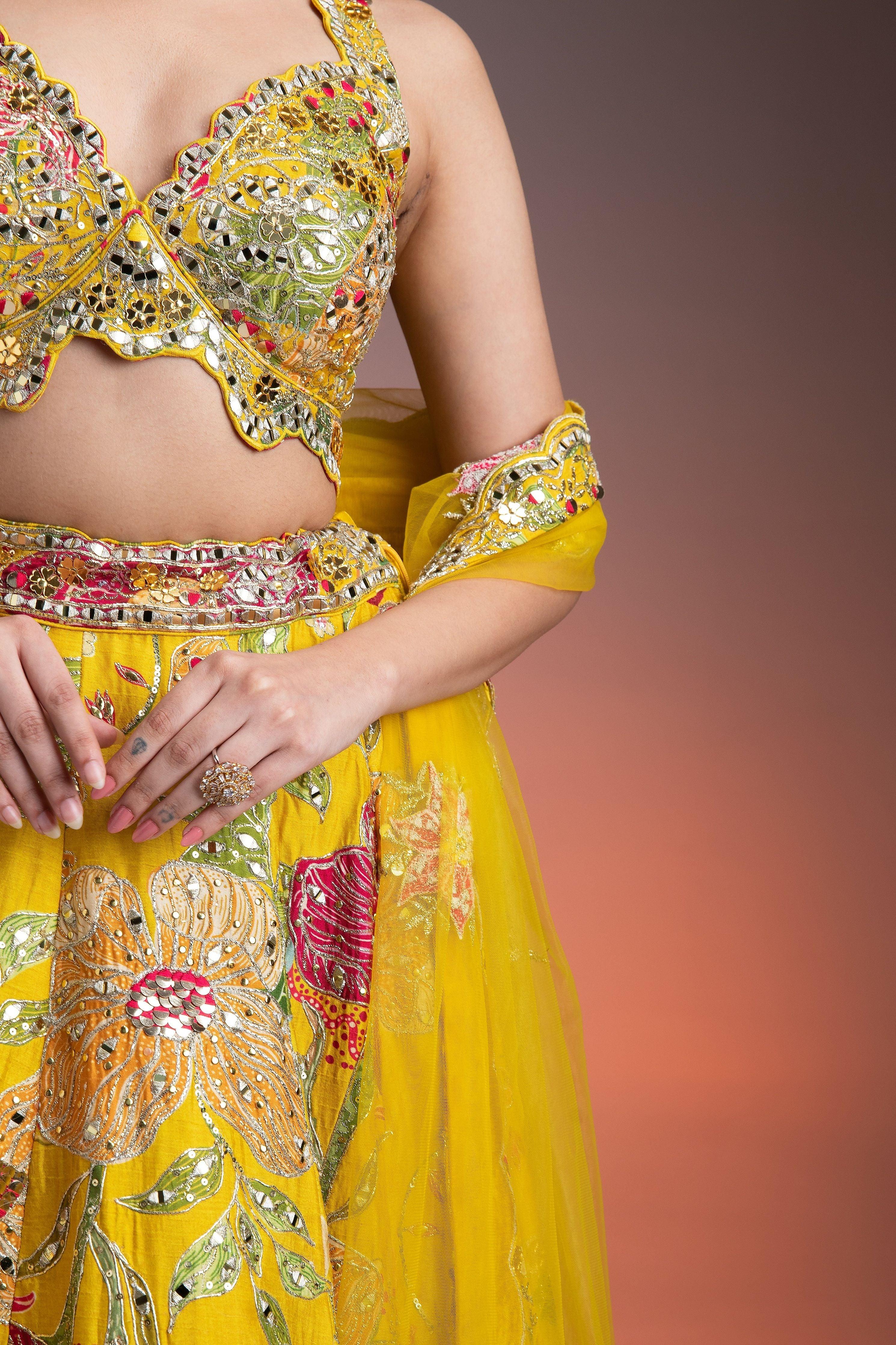 Bright Yellow Silk Lehenga with Multicolor Floral Print and Mirror Embellishments  Mokshaa