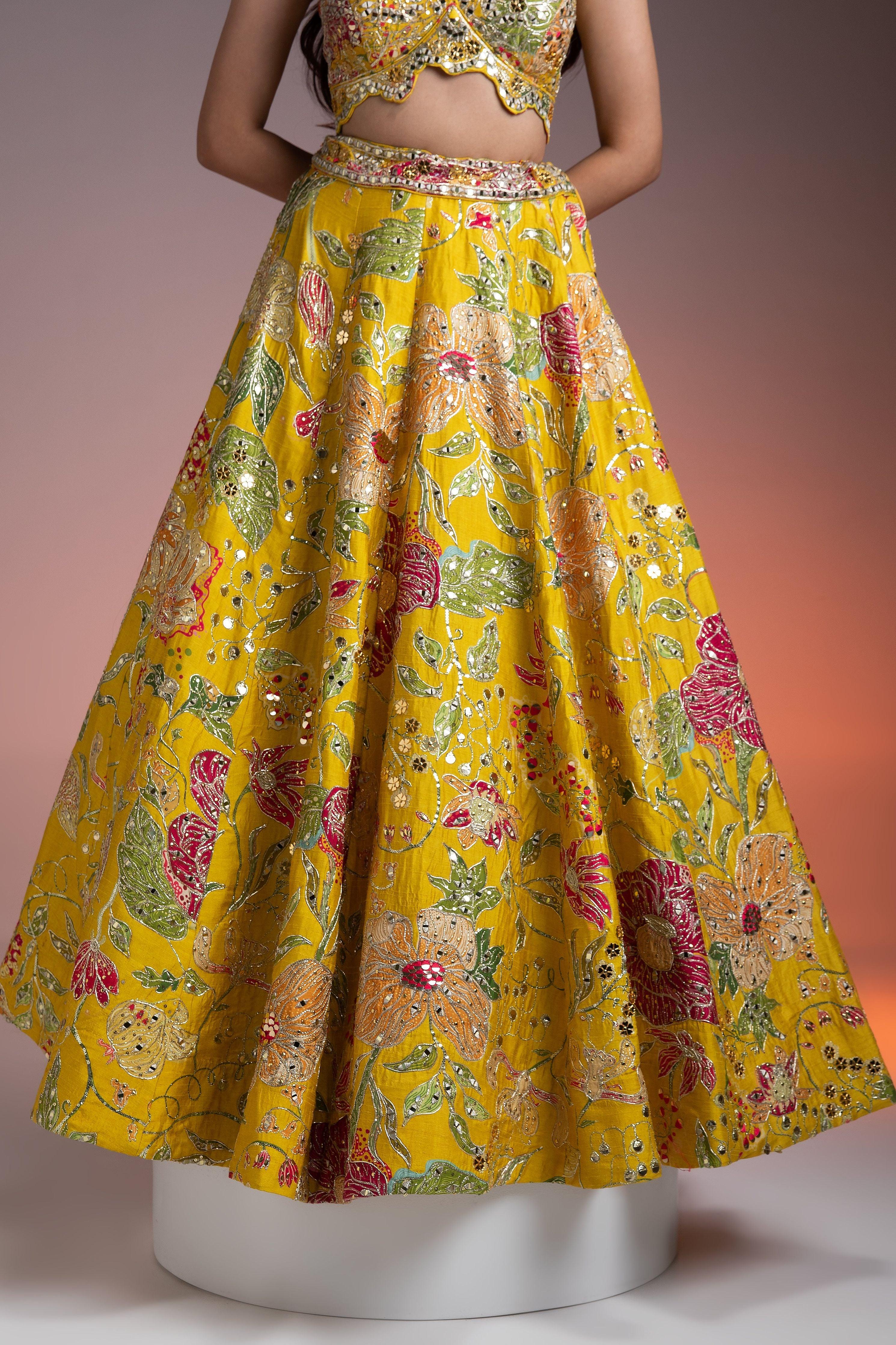 Bright Yellow Silk Lehenga with Multicolor Floral Print and Mirror Embellishments  Mokshaa