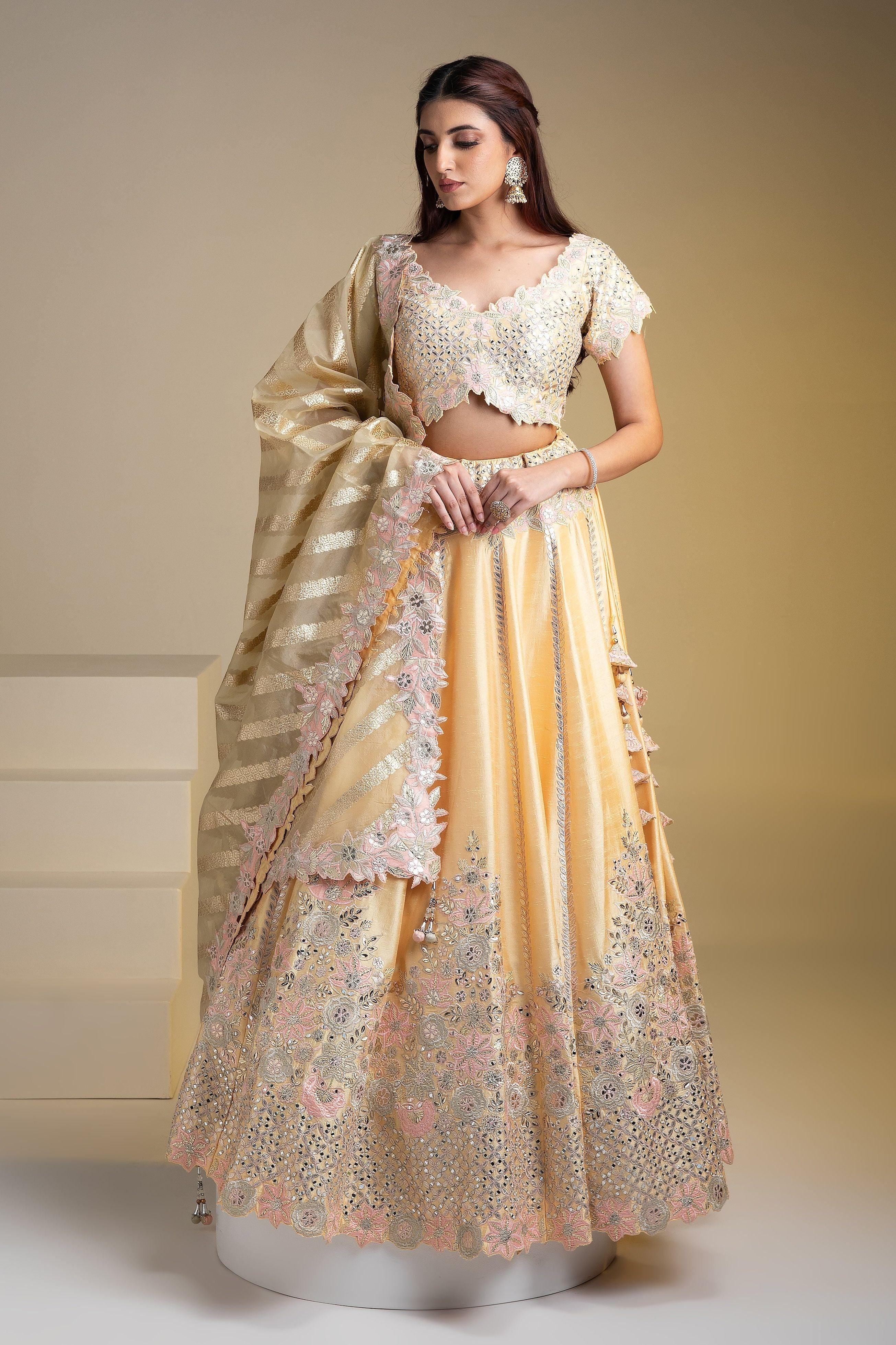Maize Yellow Silk Lehenga with Pastel Floral Accents and Green Dupatta - Mokshaa