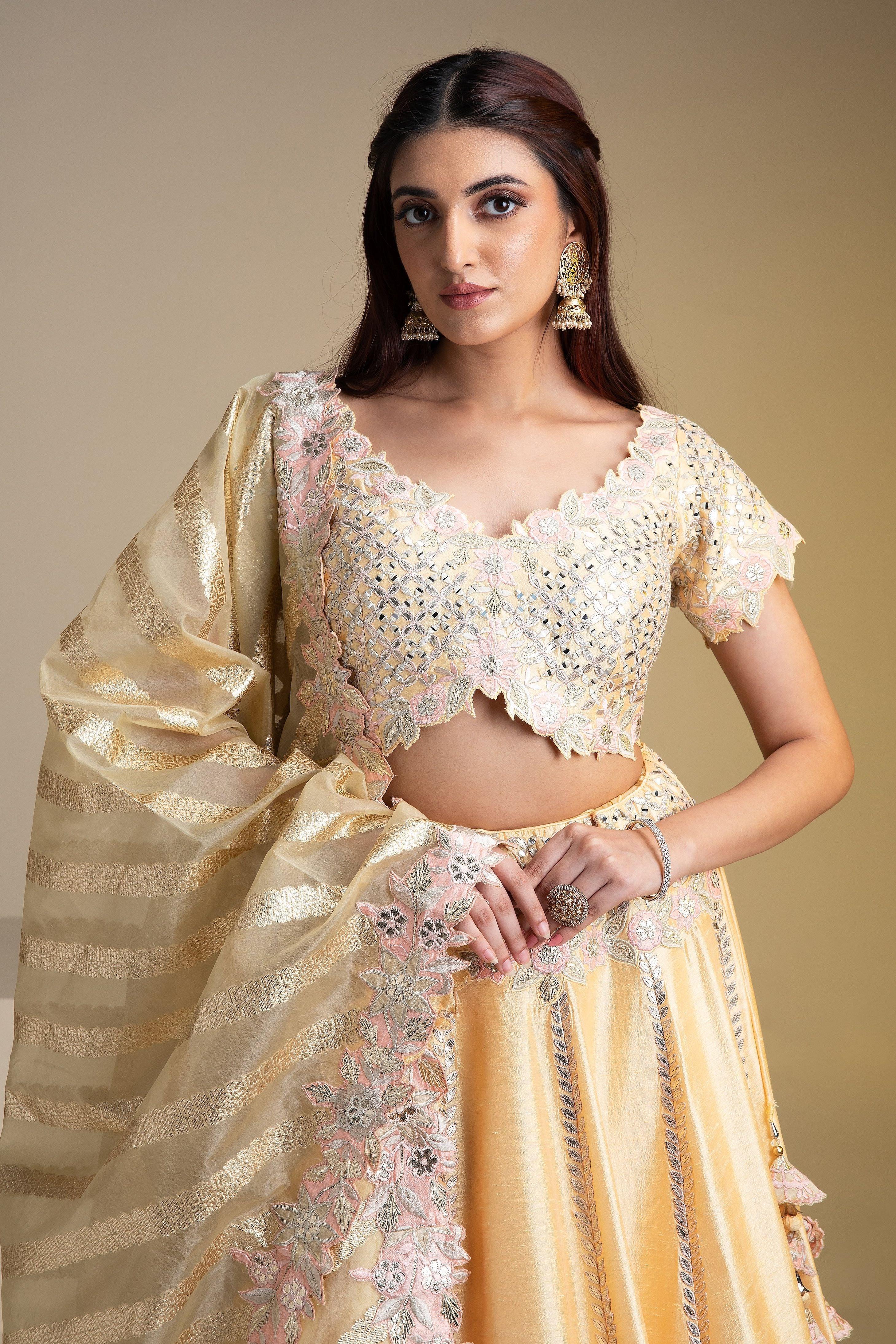 Maize Yellow Silk Lehenga with Pastel Floral Accents and Green Dupatta - Mokshaa