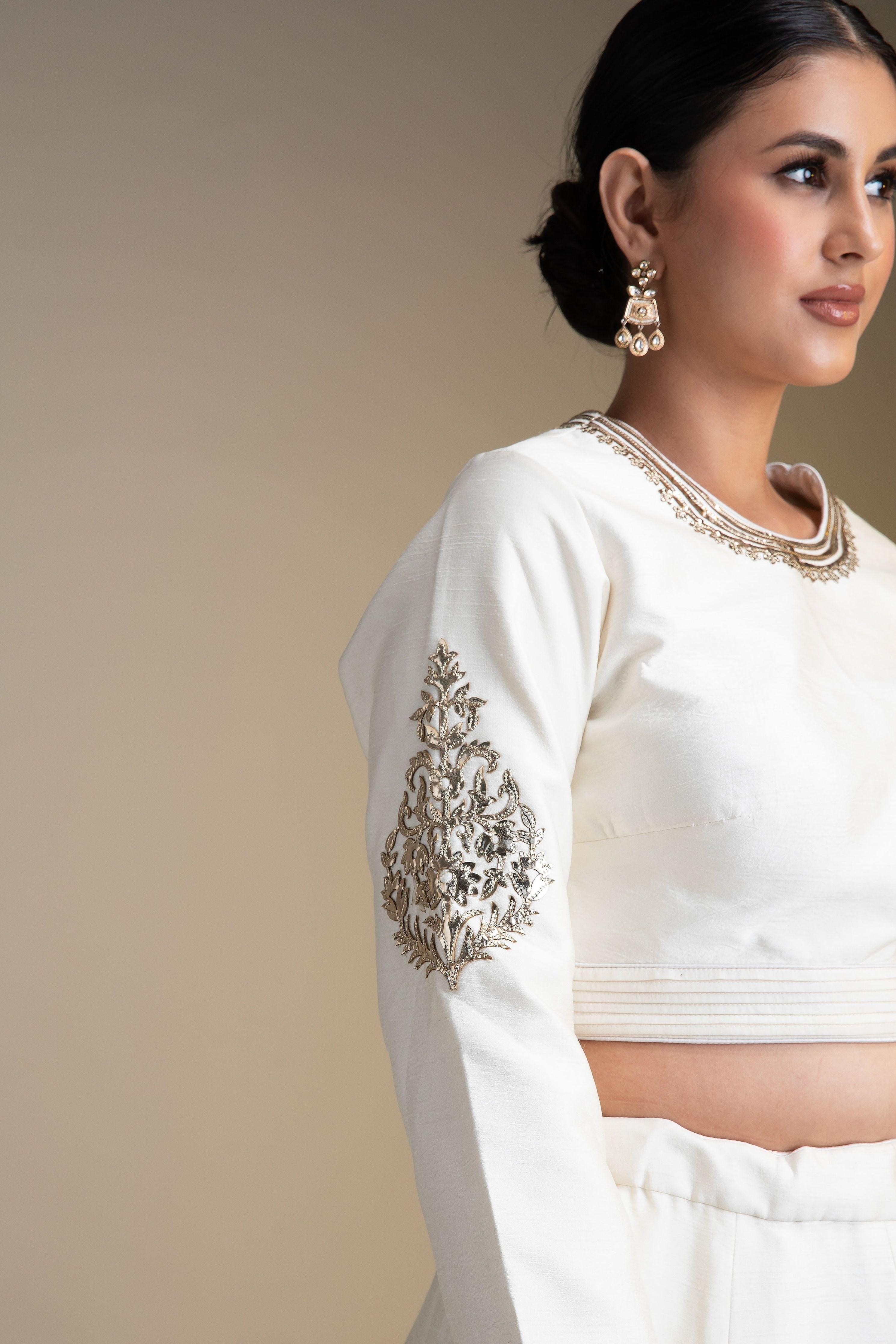 Pristine White Silk Lehenga Set with Metallic Gold Embroidery - Mokshaa