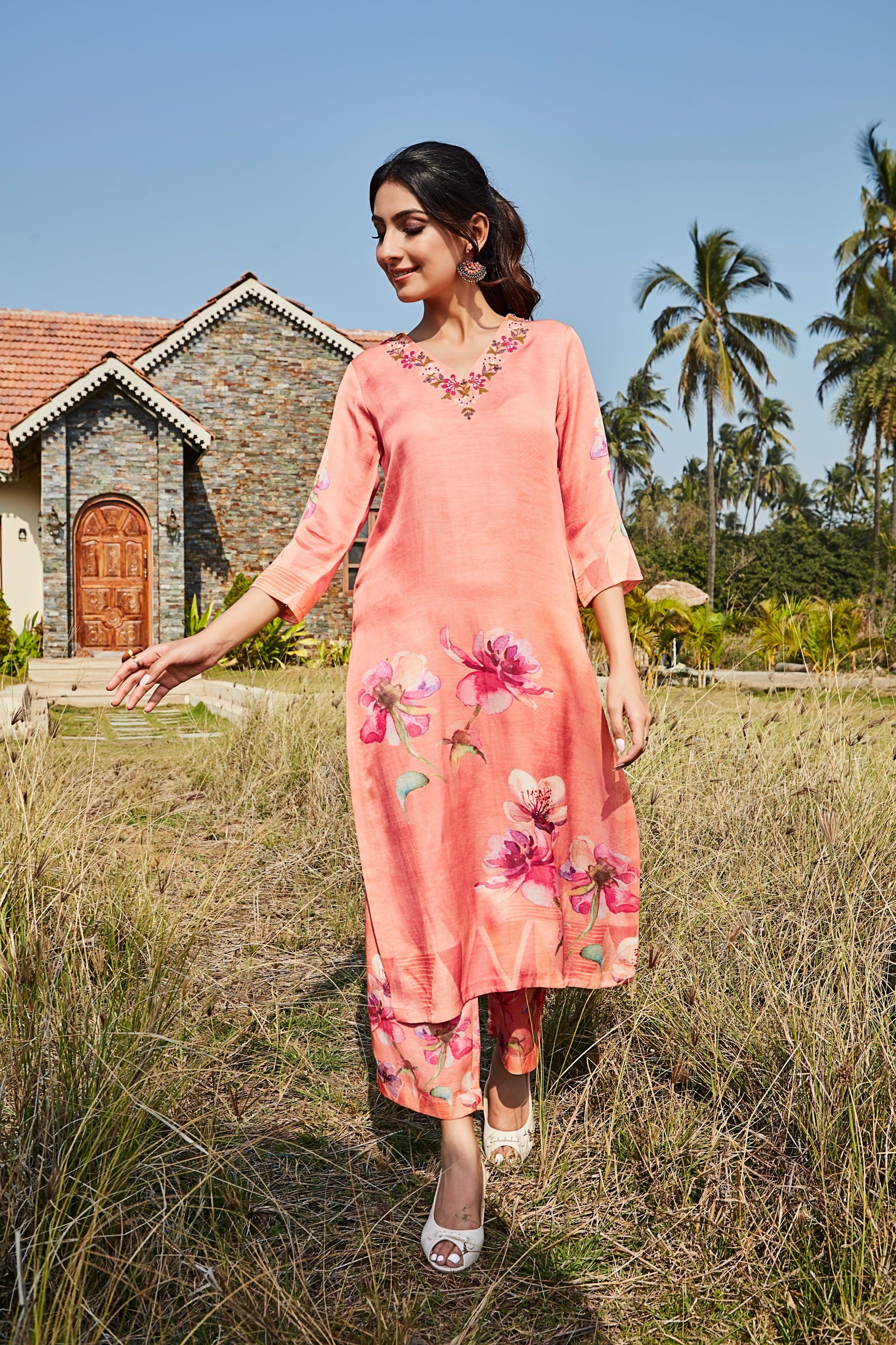 Peach Kurta Set with Bold Floral Prints and Embroidered Neckline  Mokshaa