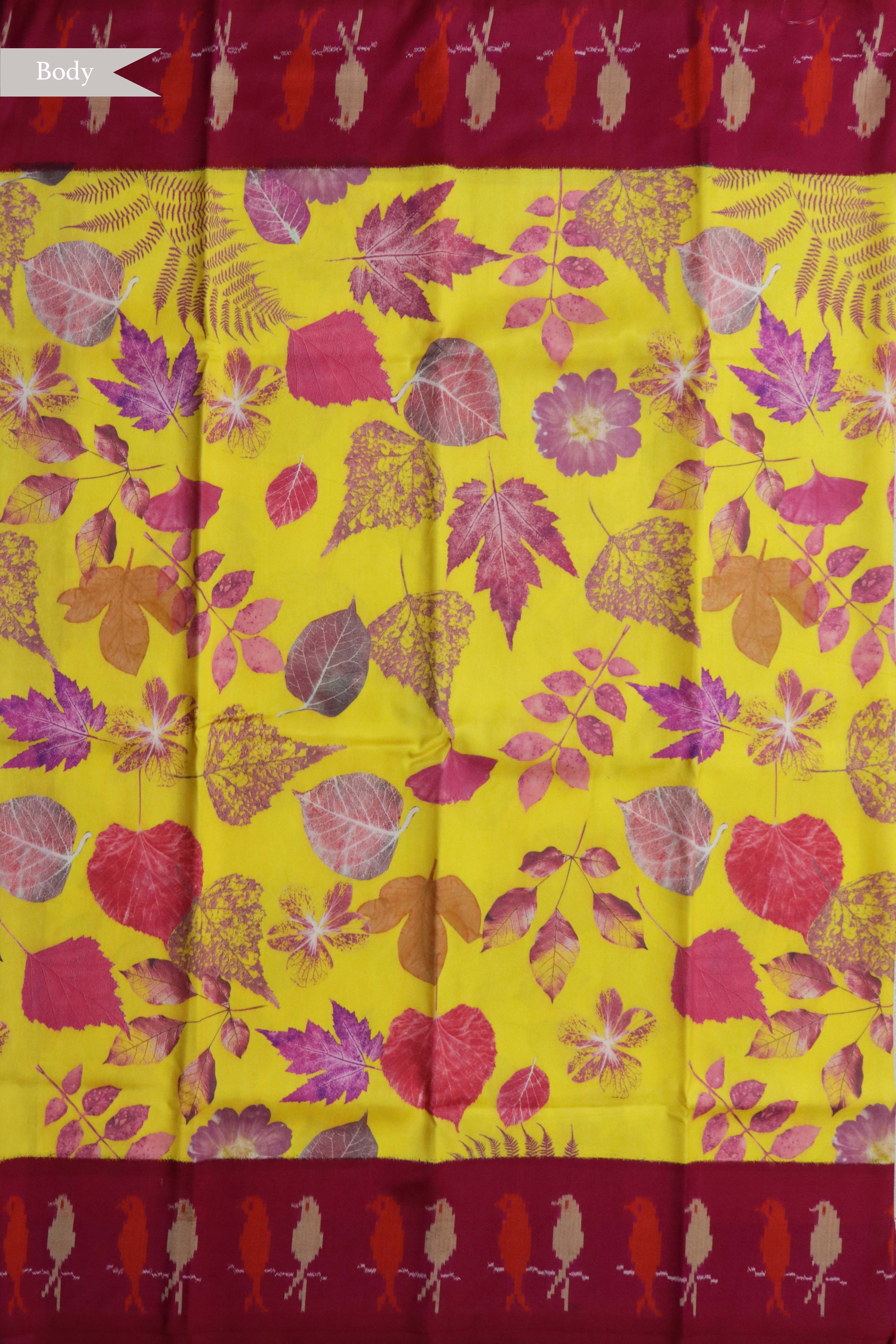 Yellow Printed Silk Saree with Ikat Border