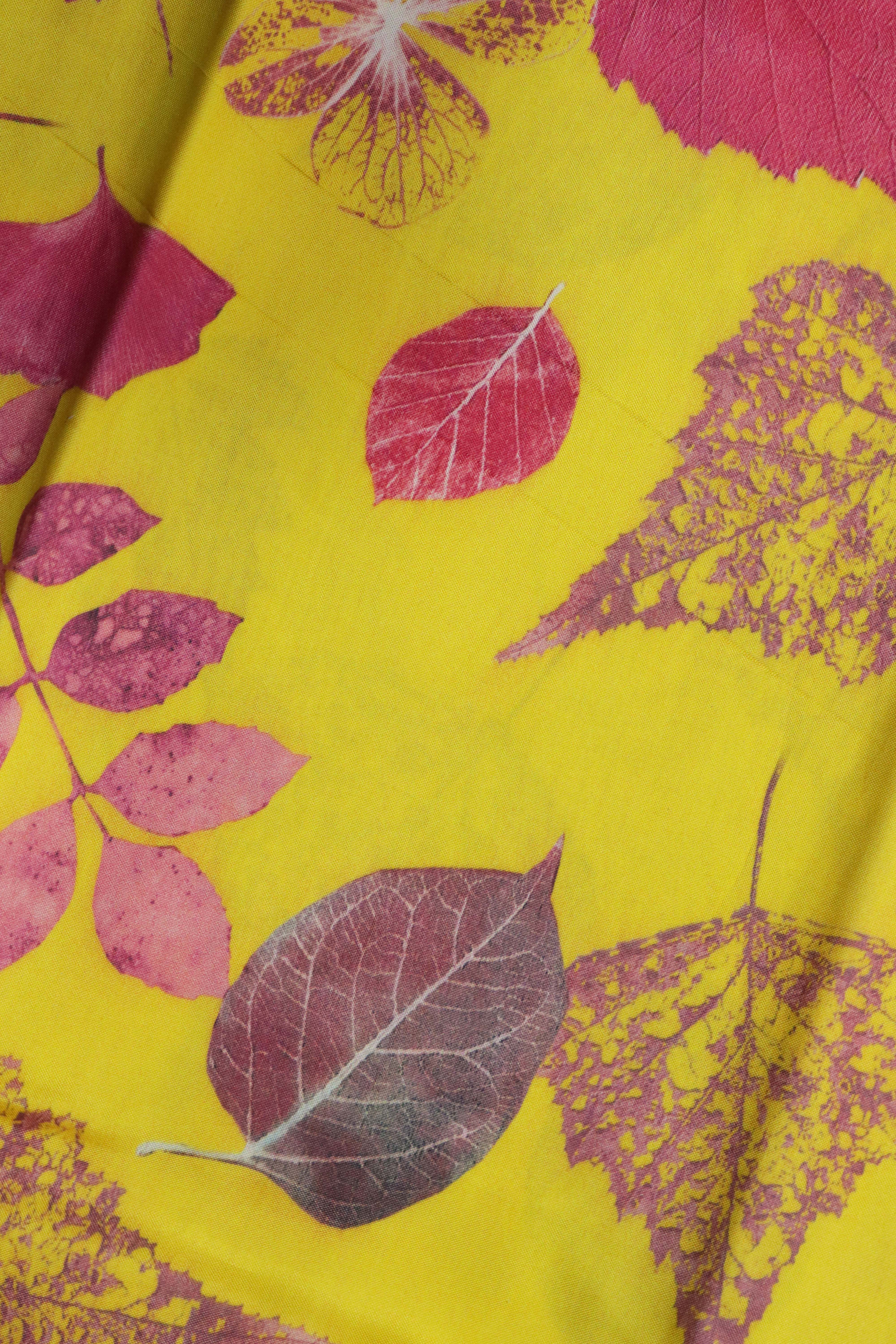 Yellow Printed Silk Saree with Ikat Border