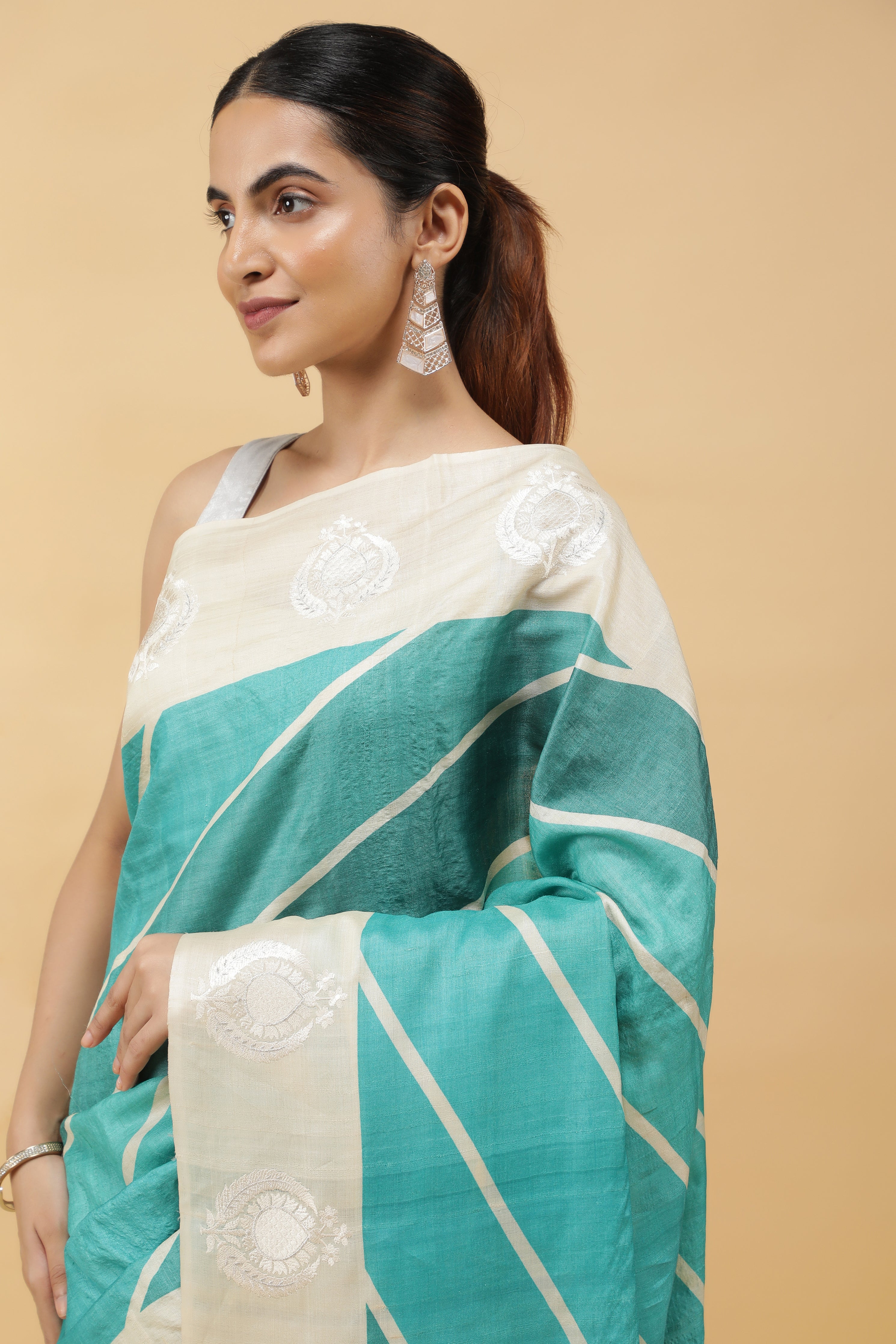 Turquoise Blue Tussar Silk Saree with Zari Motifs