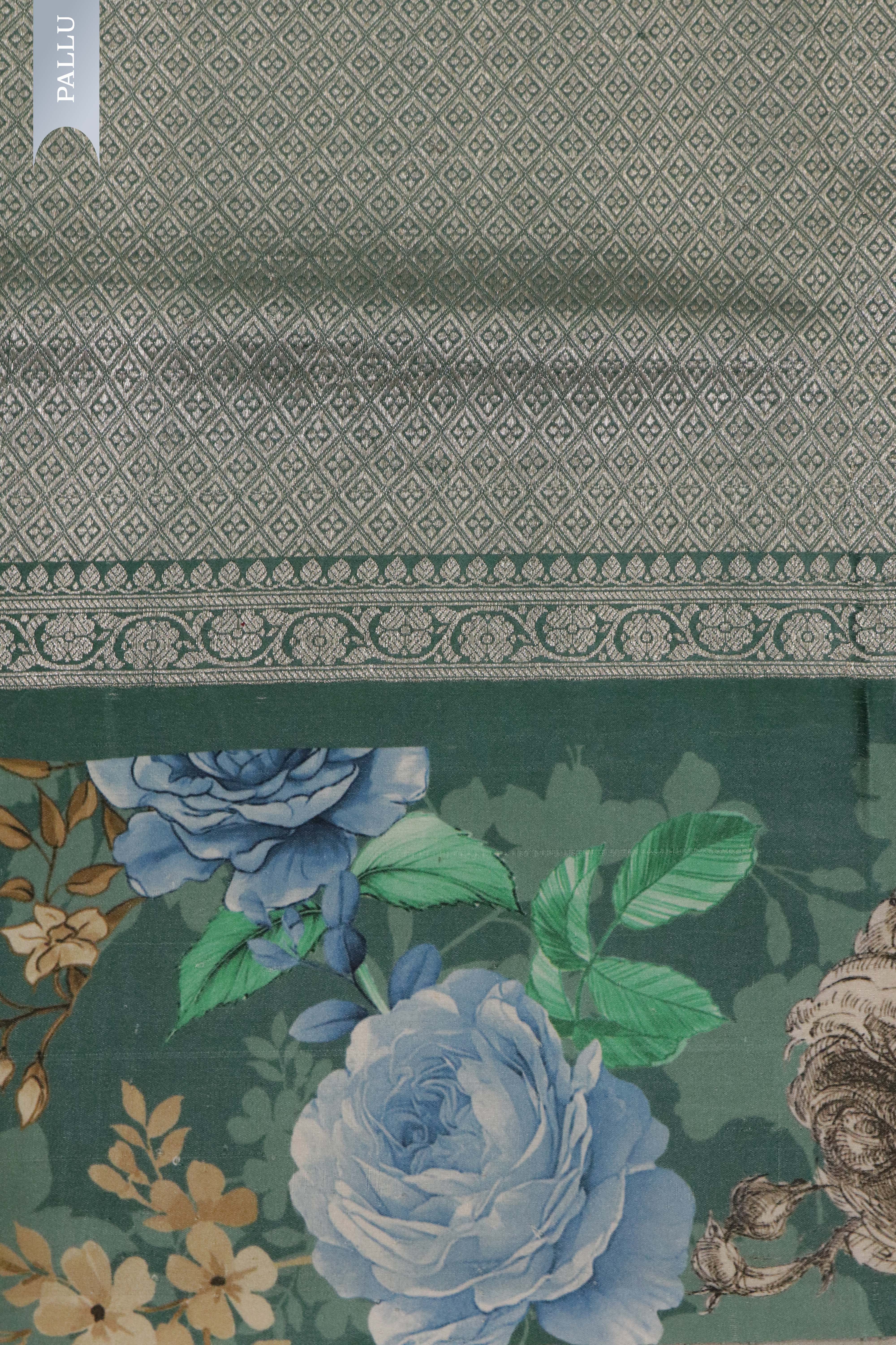 Turf Green Tussar Silk Saree with Silver Zari Motifs & Printed Border