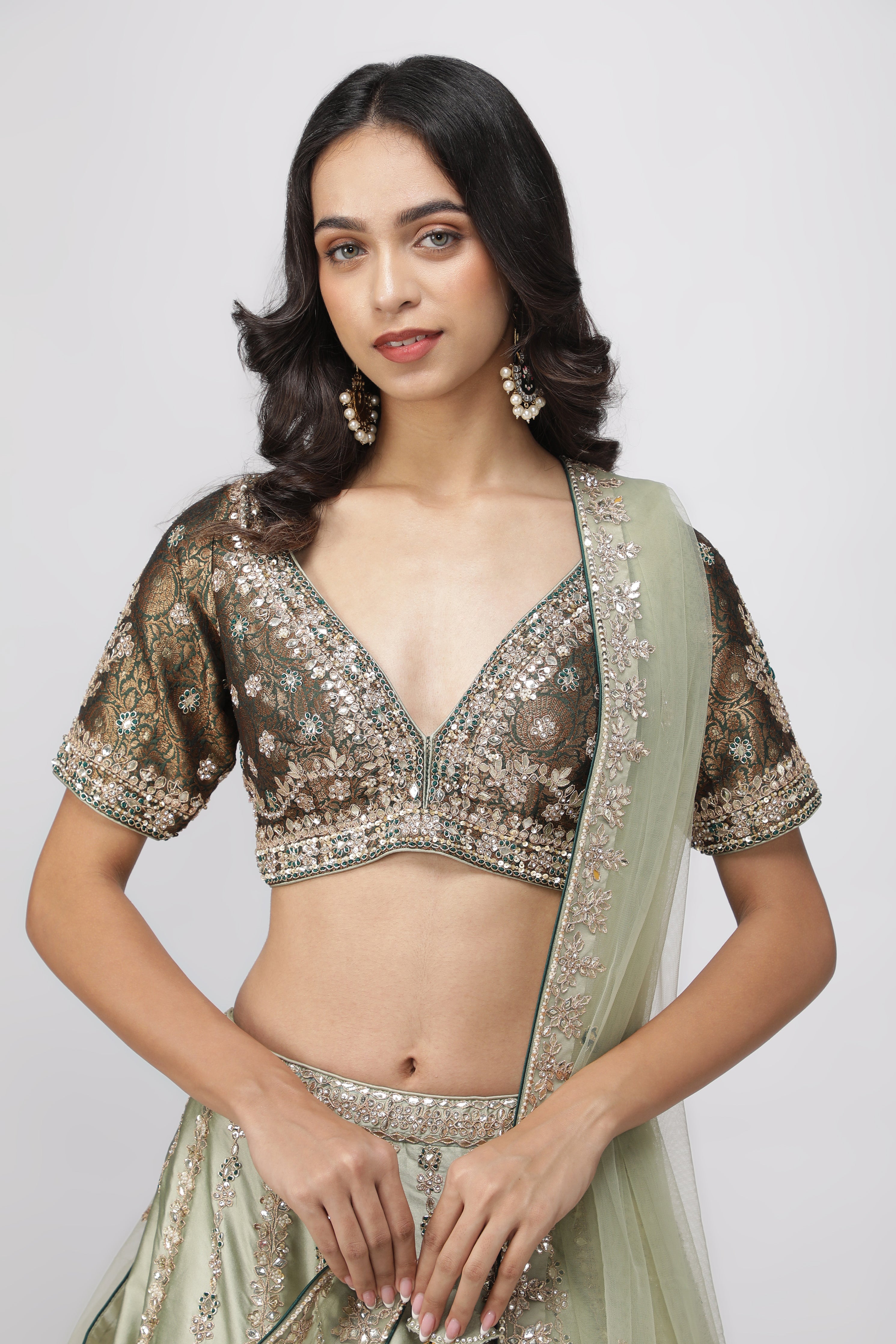 Mint Green Silk Lehenga with Bottle Green Banarasi Blouse