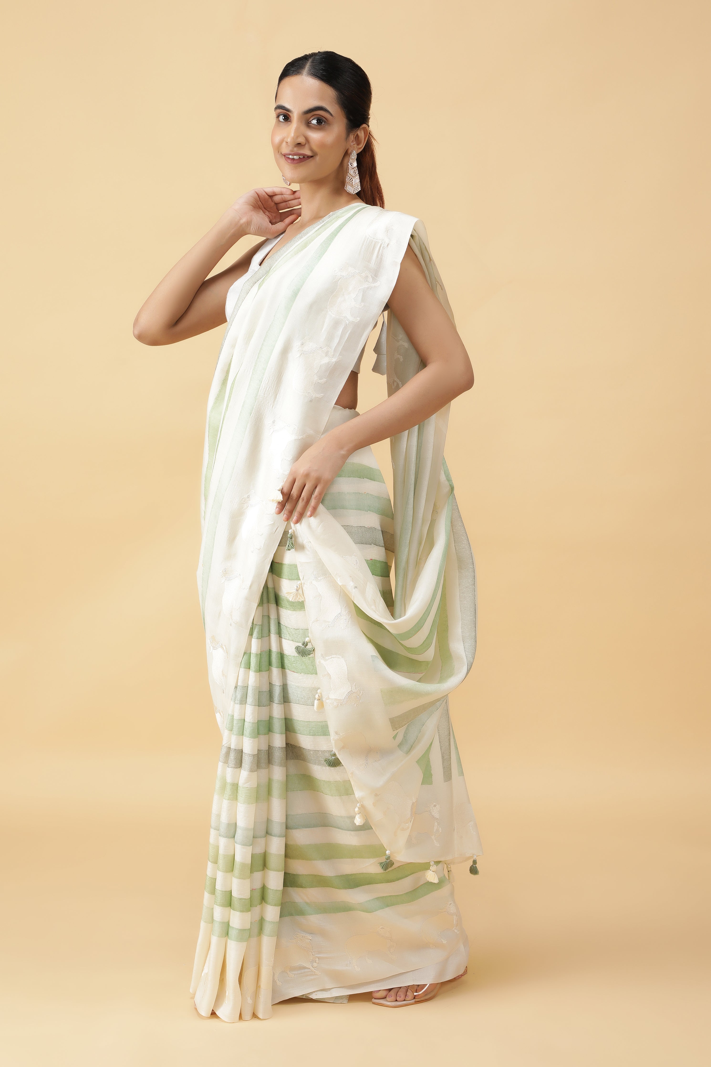 Green & Off White Tussar Silk Saree with Animal Motifs