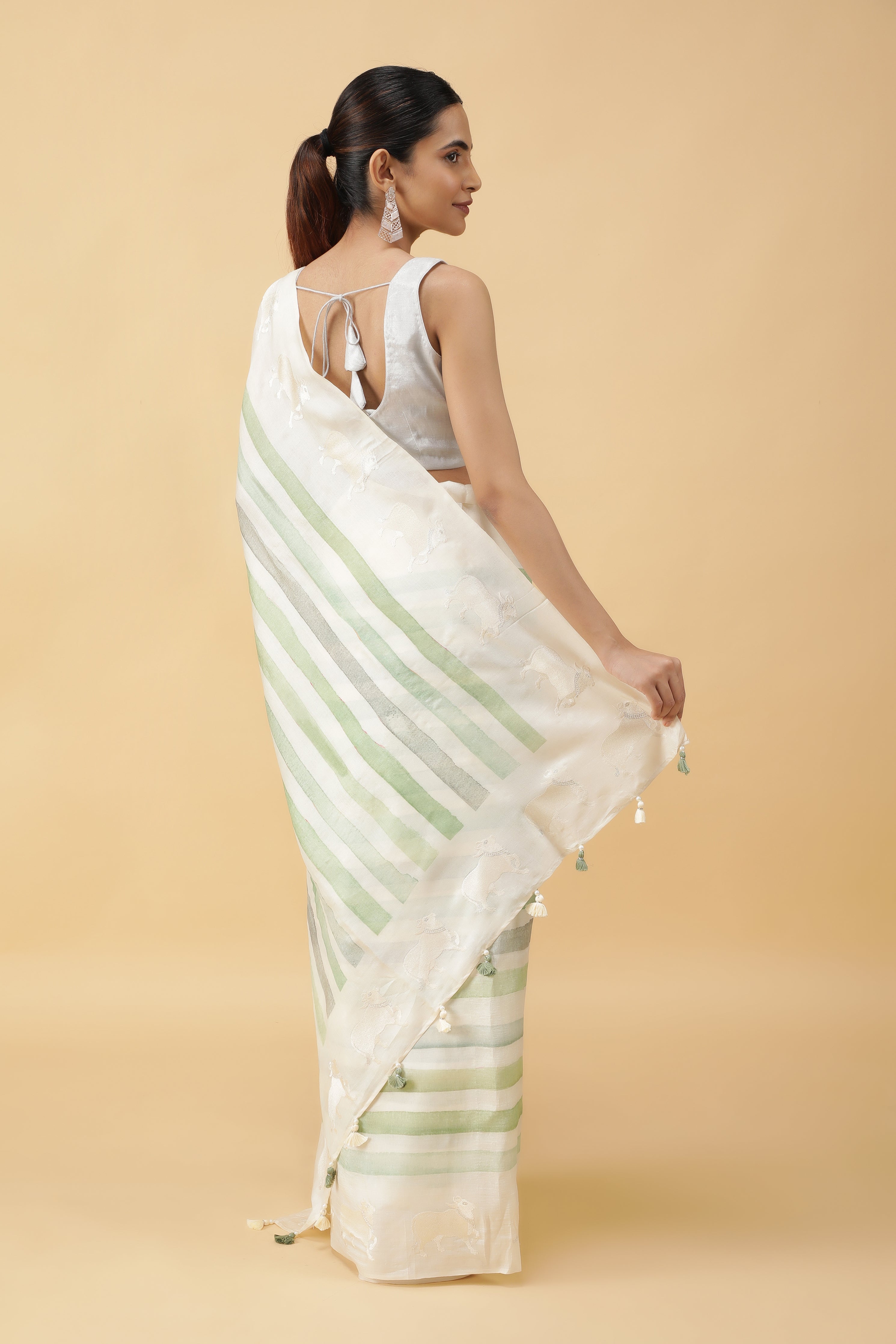 Green & Off White Tussar Silk Saree with Animal Motifs