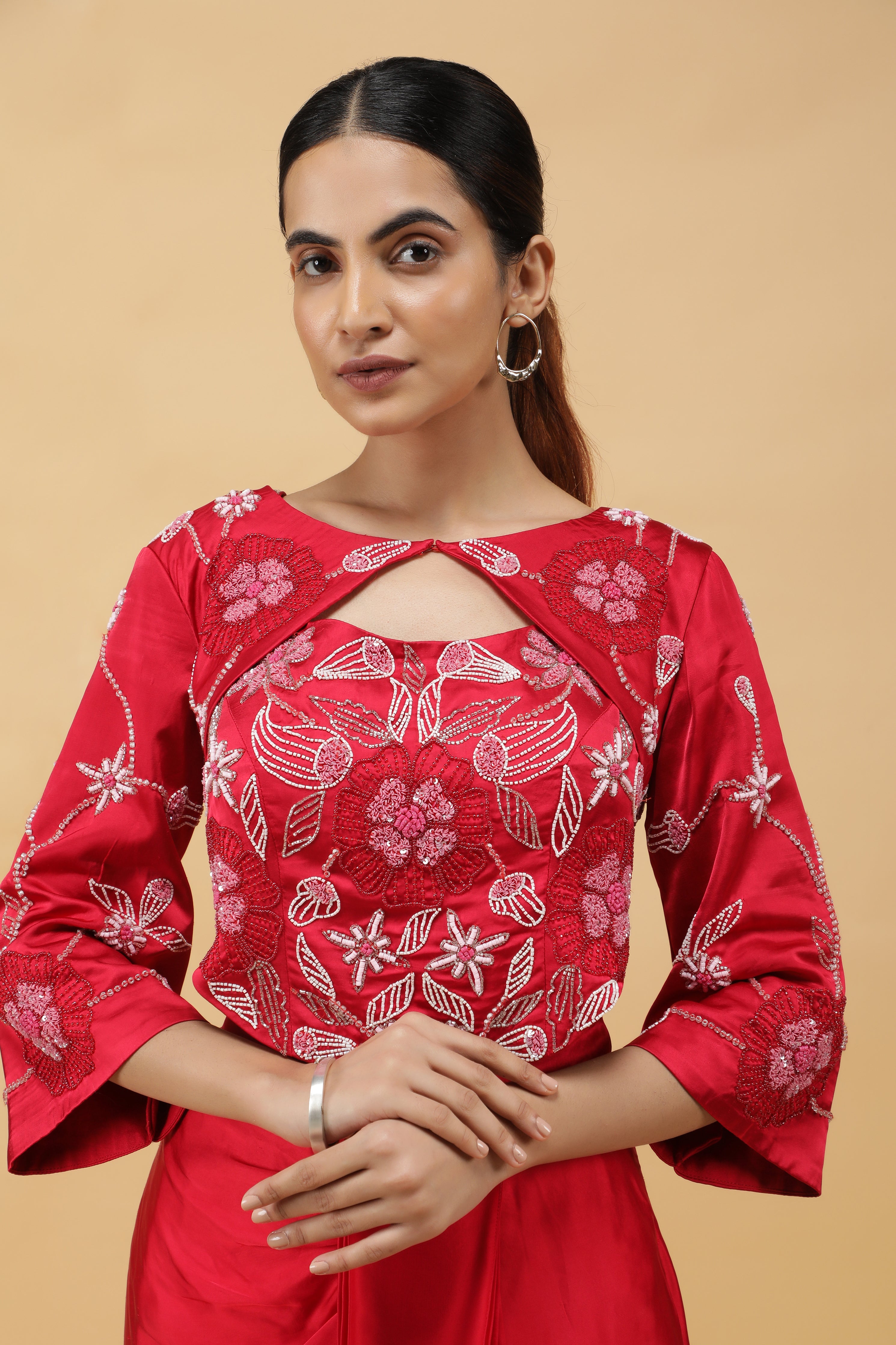 Red Satin Corset Top with Embroidered Jacket and Draped Skirt