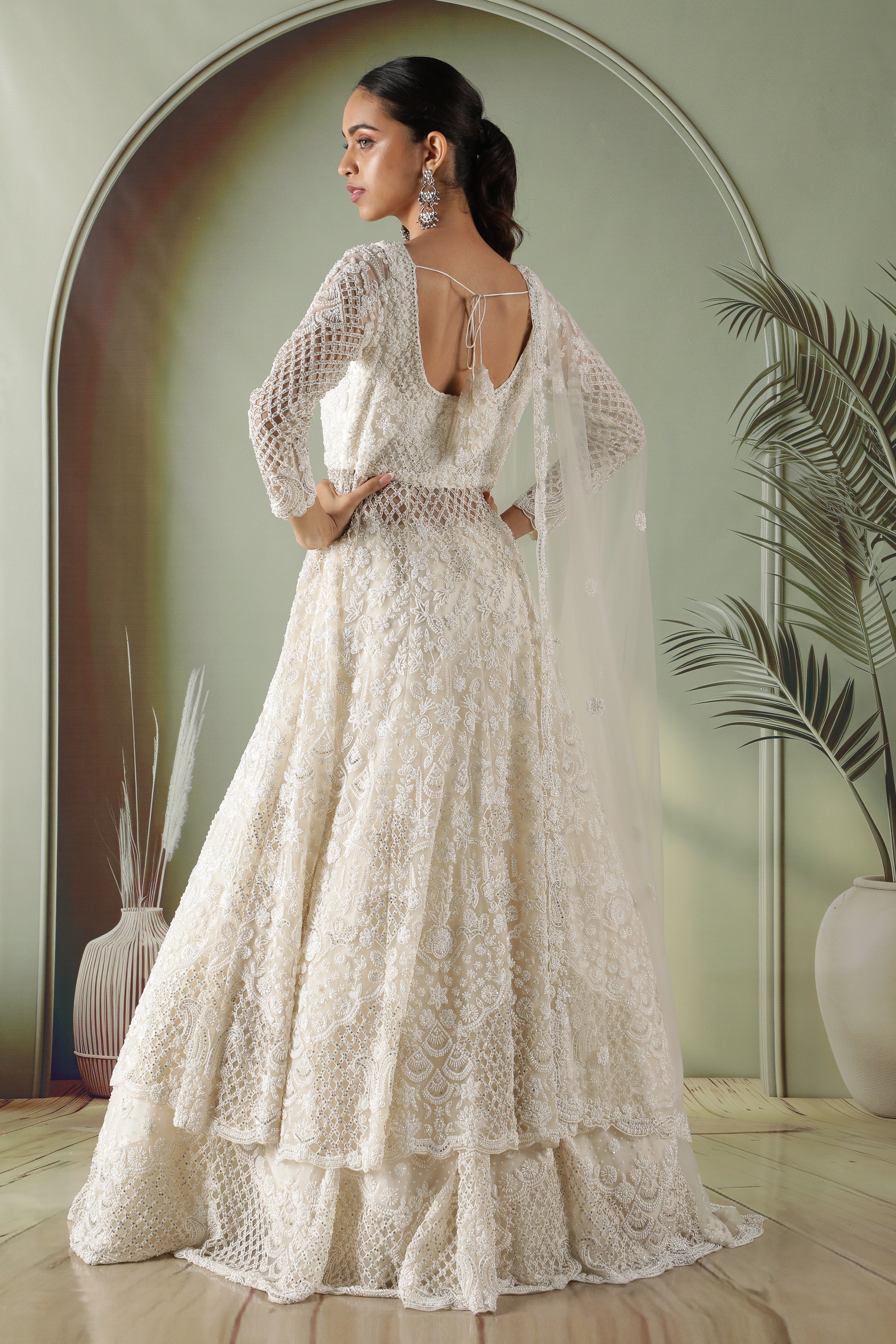 Radiant Pearl Cutwork Net Jacket Lehenga Set